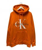 Calvin Klein Jeans（カルバンクラインジーンズ）の古着「スウェットパーカー」｜オレンジ