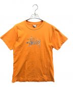 stussyステューシー）の古着「Tシャツ」｜オレンジ