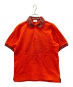 HERMESエルメス）の古着「セリエボタンポロシャツ」｜オレンジ