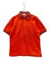 HERMES（エルメス）の古着「セリエボタンポロシャツ」｜オレンジ