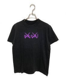 sacai（サカイ）の古着「KAWS Flock Print T-Shirt」｜ブラック