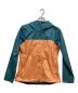 Patagonia（パタゴニア）の古着「W’s Torrentshell Jacket」｜グリーン×オレンジ