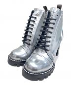 LOUIS VUITTON）の古着「Star Trail V Spaceship Ankle Boots 」｜シルバー