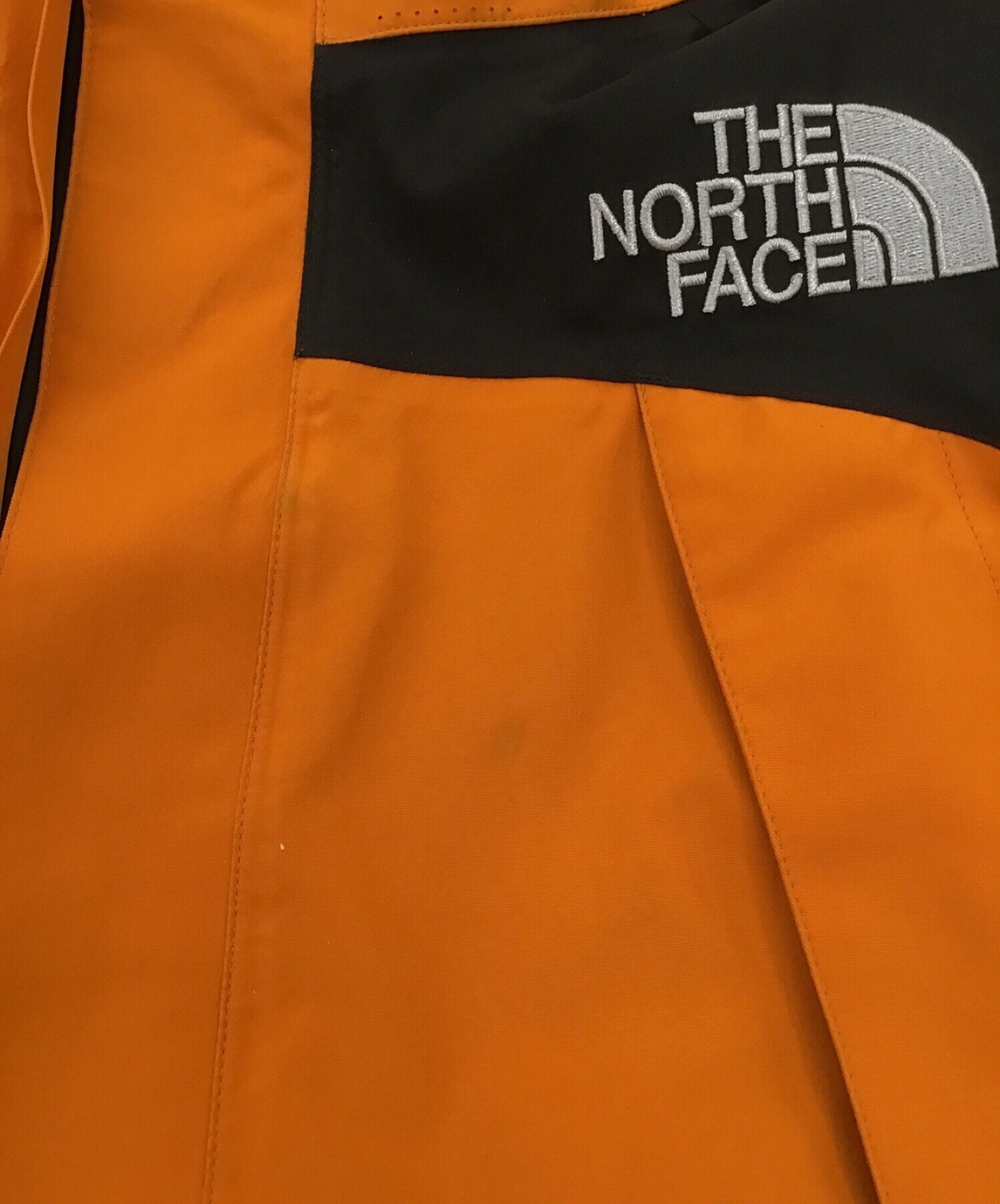 THE NORTH FACE (ザ ノース フェイス) マウンテンジャケット オレンジ×ブラック サイズ:S