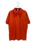 HERMES（エルメス）の古着「メタルボタンパイピングポロシャツ」｜オレンジ
