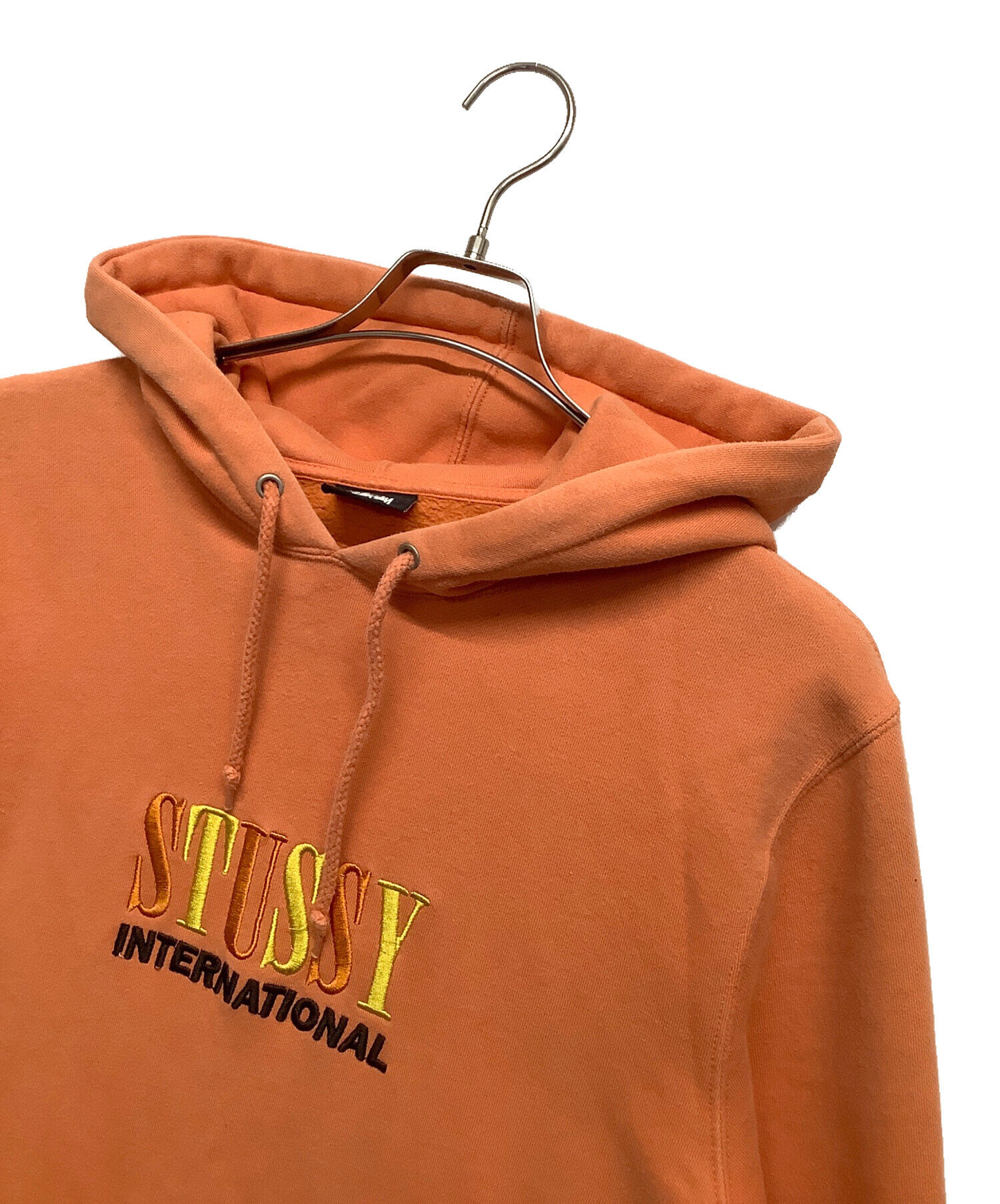 Stussy プルオーバーパーカー オレンジ 中古・古着通販】stussy (ステューシー) パーカー オレンジ サイズ:L