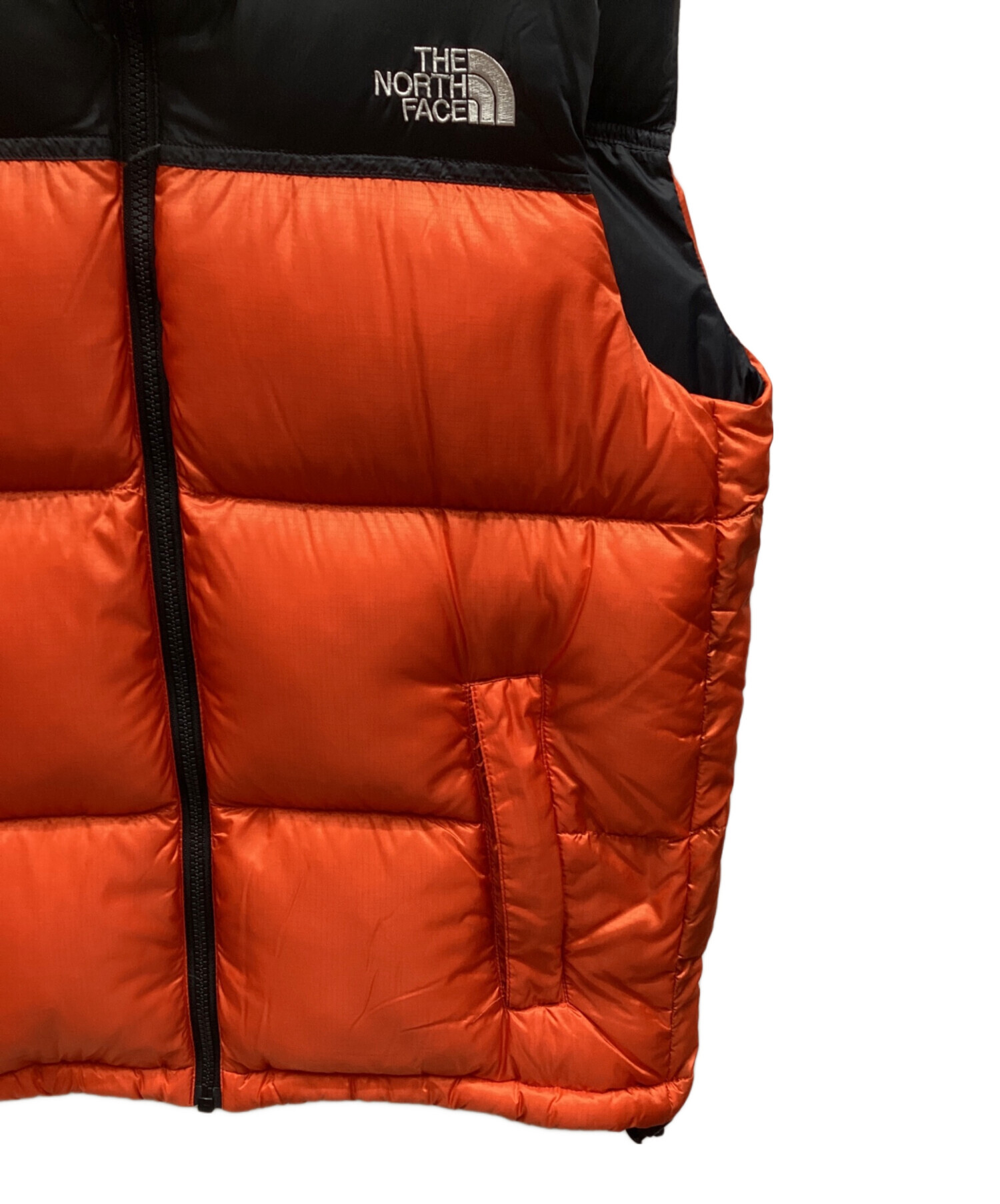 【ヤドカリ】THE NORTH FACE ダウンベスト オレンジ (S) 中古・古着通販】THE NORTH FACE (ザ ノース フェイス) ダウンベスト