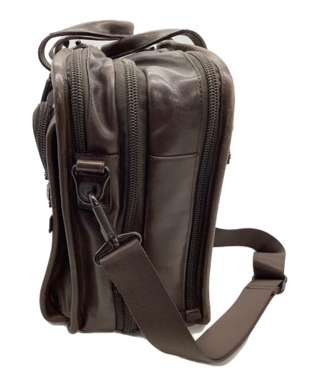 未使用品訳ありTUMI トゥミ　ビジネスバッグ ブラウン　2Way 美品 TUMI トゥミ ビジネスバッグ 2way レザー ダークブラウン 2層