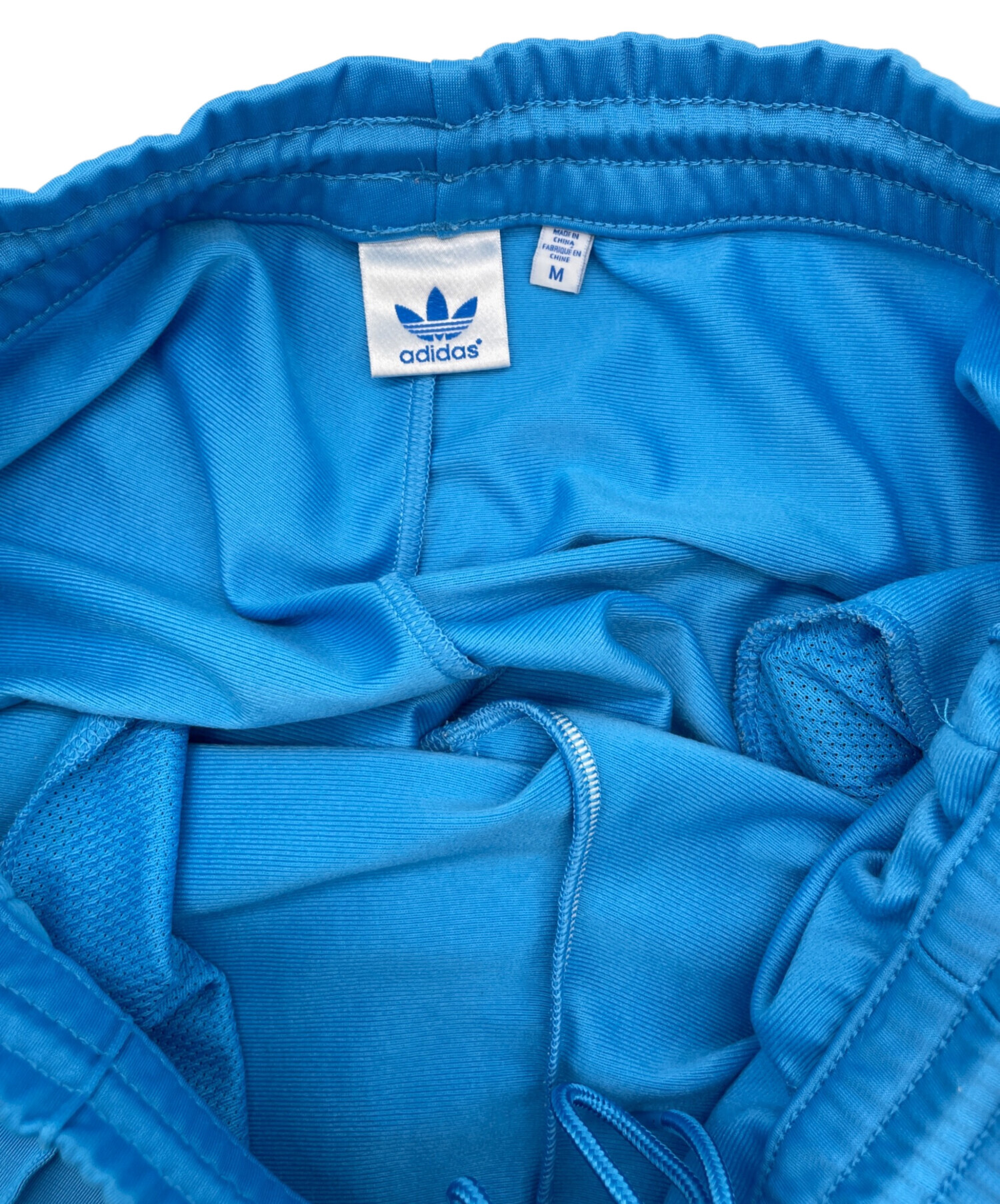 中古・古着通販】adidas (アディダス) トラックパンツ スカイブルー