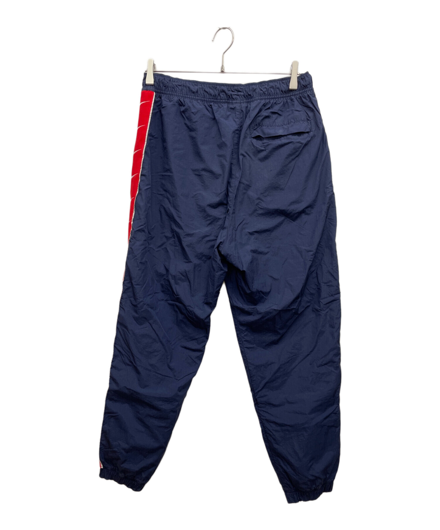 中古・古着通販】NIKE (ナイキ) ナイロンパンツ ネイビー サイズ:L