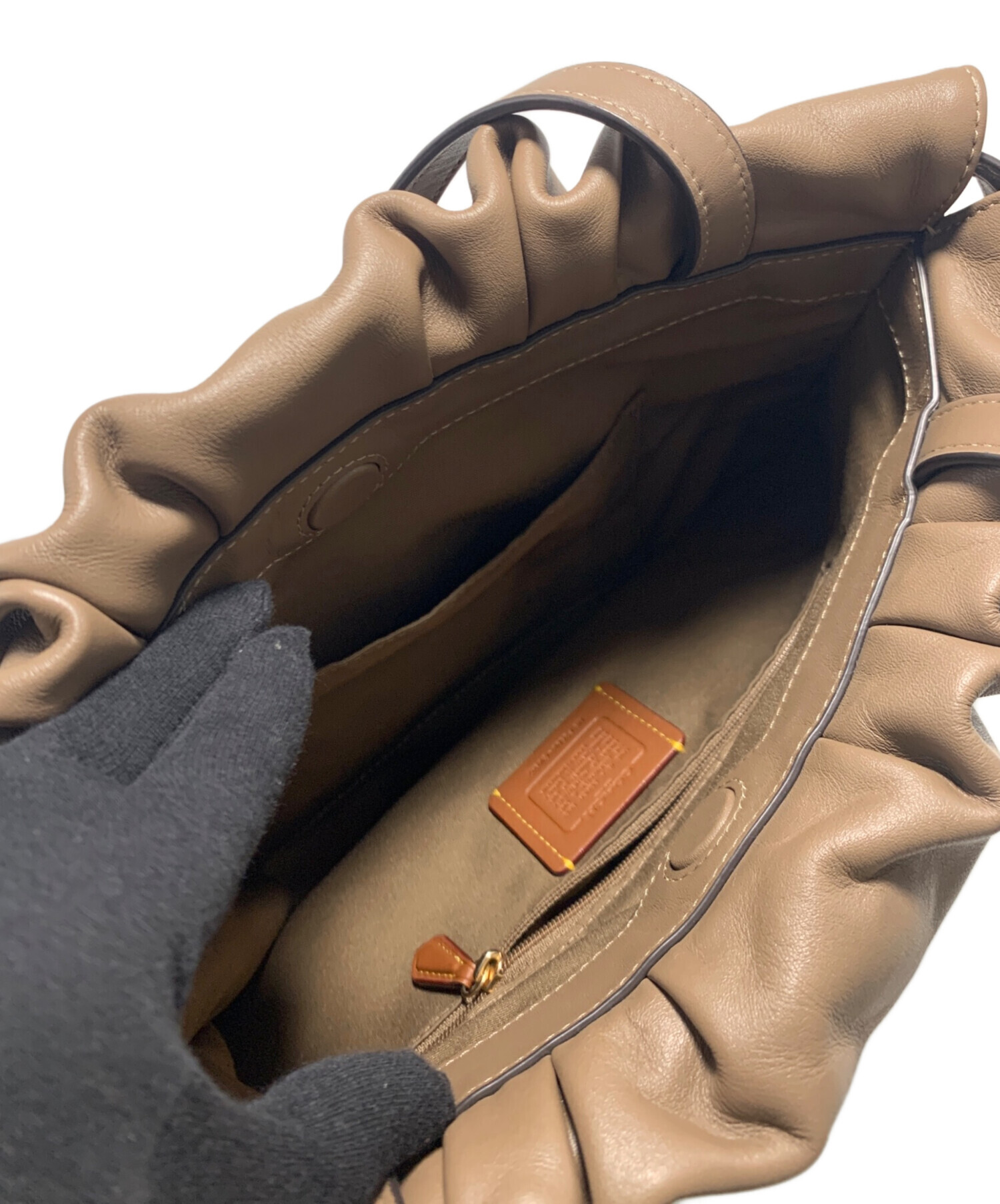 COACH コーチ/ラウンドセラミッククォーツ/レディース/CA.67.7.28.0948/Aランク/75【中古】 中古・古着通販】COACH (コーチ) フェイ ドローストリングトート