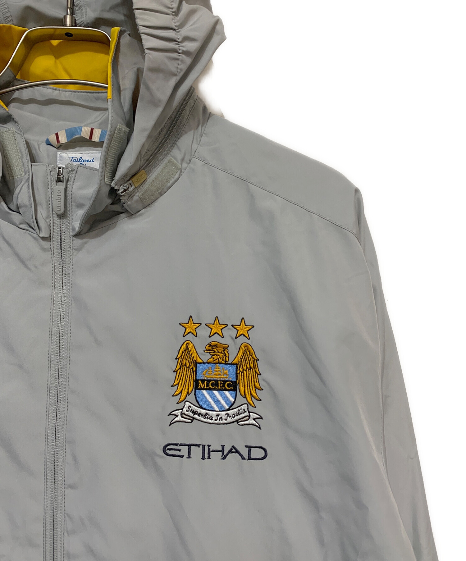 中古・古着通販】UMBRO (アンブロ) MCFC ETIHAD フーデッドジャケット