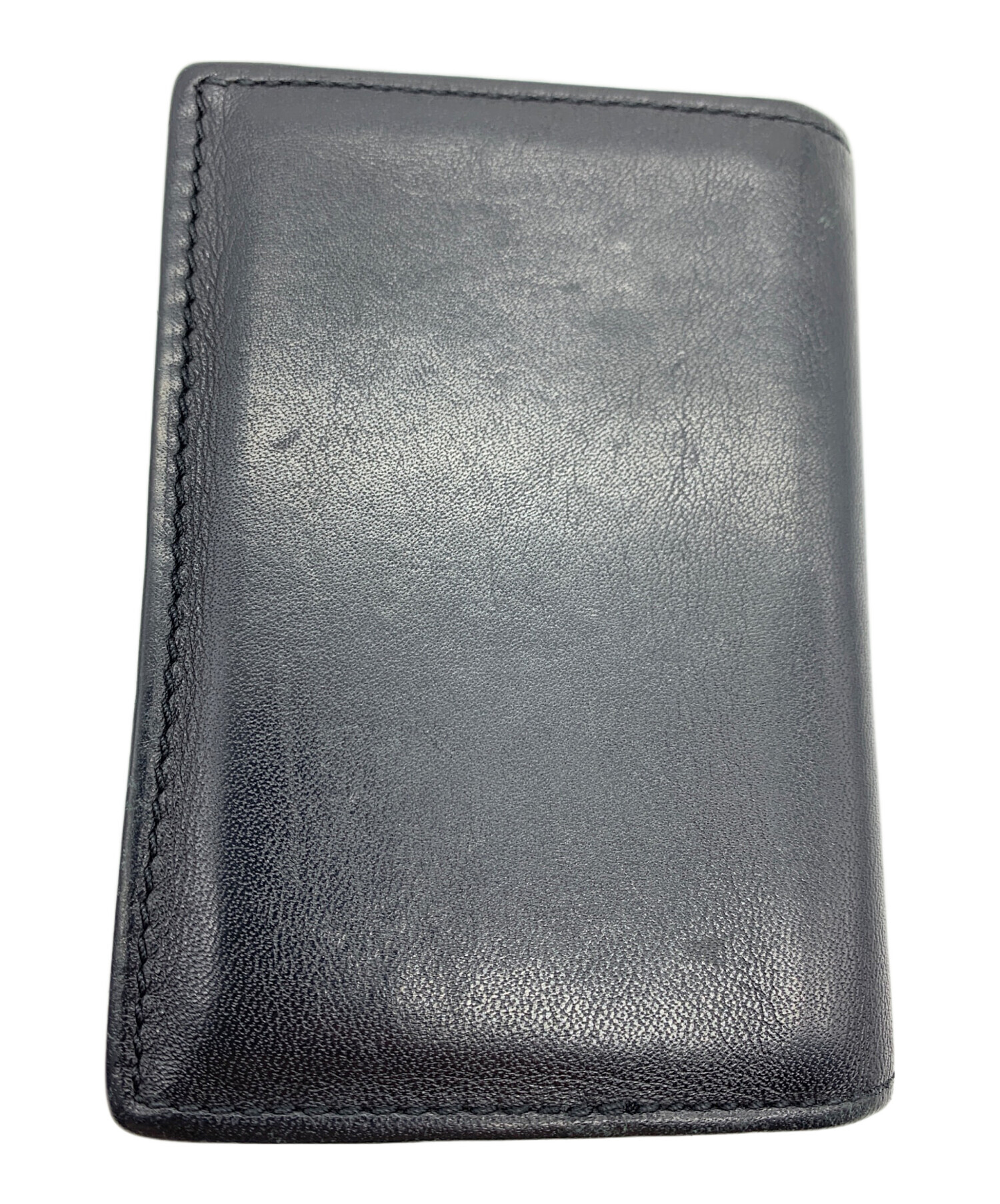 TUMI ブラック 手帳型ケース 中古・古着通販】TUMI (トゥミ) カードケース ブラック｜ブランド