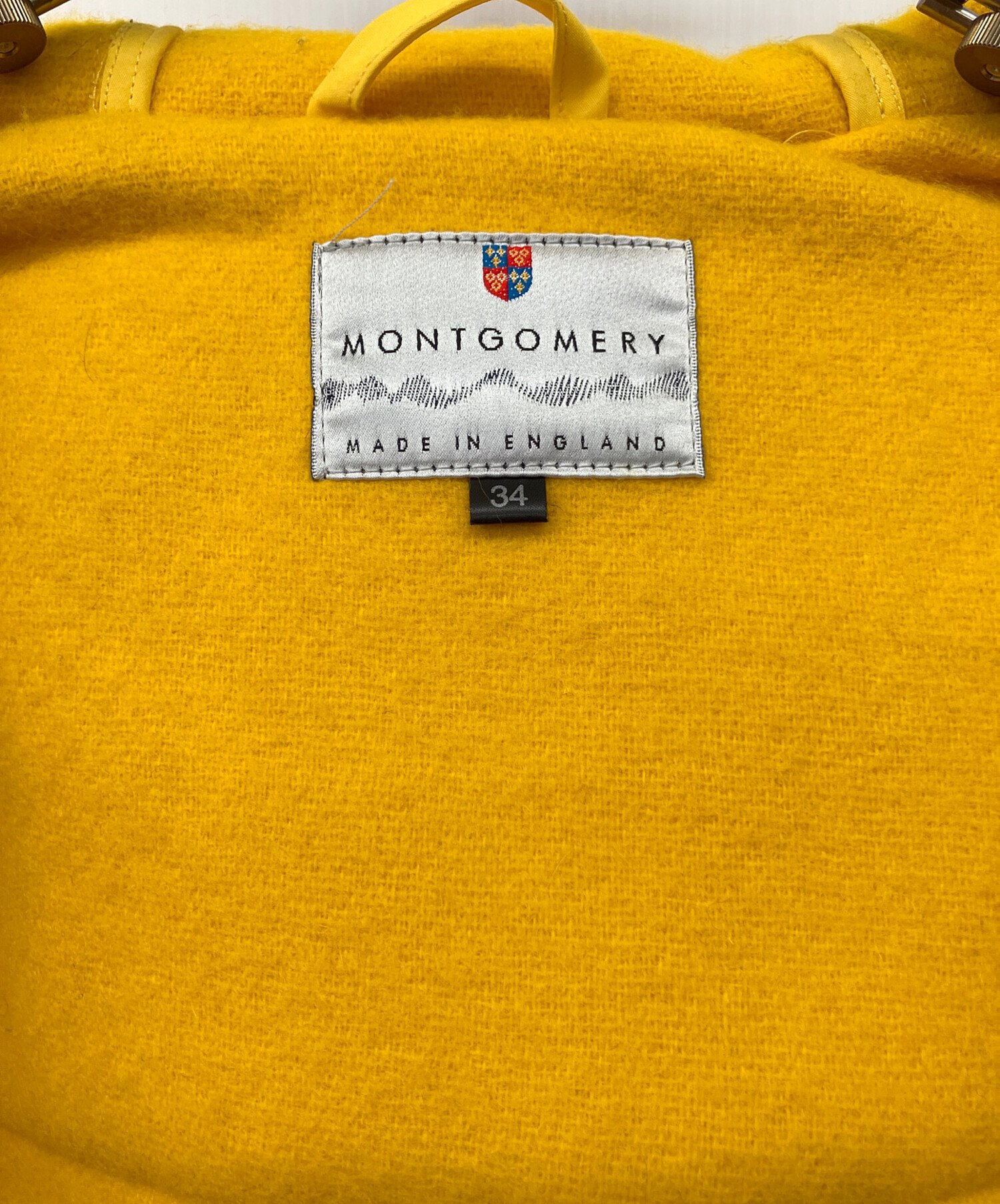 中古・古着通販】MONTGOMERY (モンゴメリー) ダッフルコート イエロー 中古・古着通販】MONTGOMERY (モンゴメリー) ダッフルコート イエロー