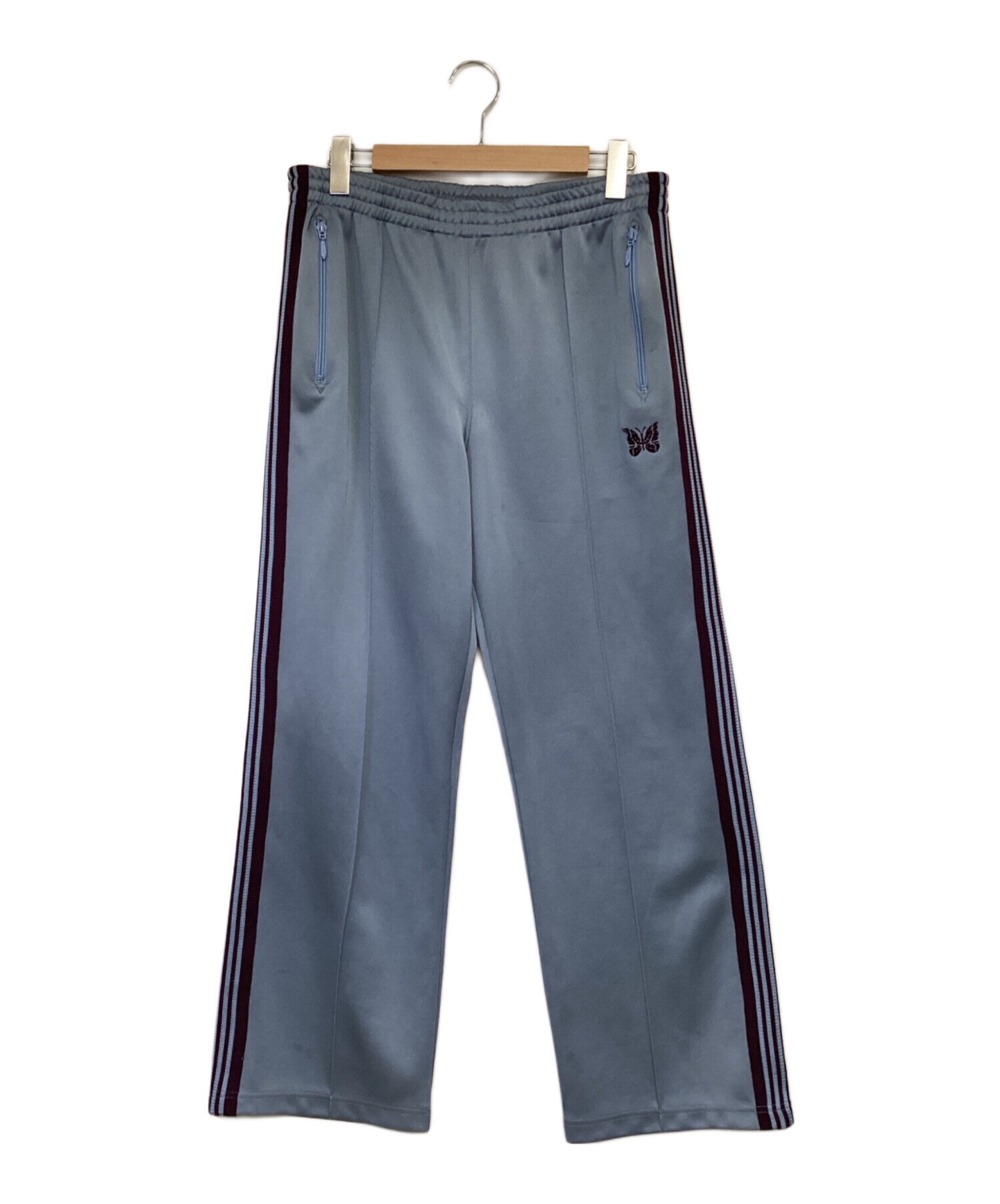 中古・古着通販】Needles (ニードルズ) トラックパンツ スカイブルー 中古・古着通販】Needles (ニードルズ) トラックパンツ スカイブルー