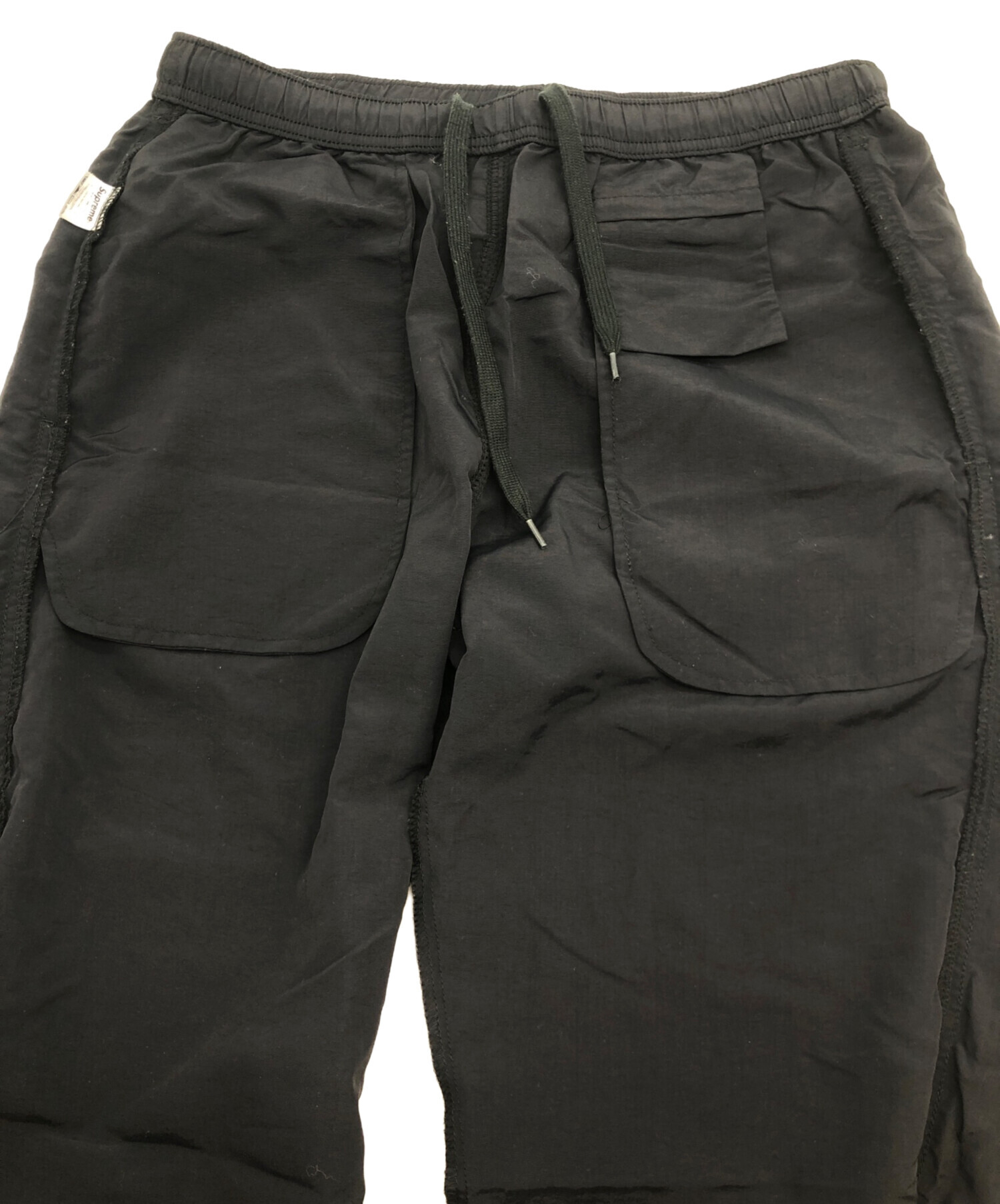 Supreme ブラックナイロンパンツ 中古・古着通販】Supreme (シュプリーム) ナイロンパンツ ブラック