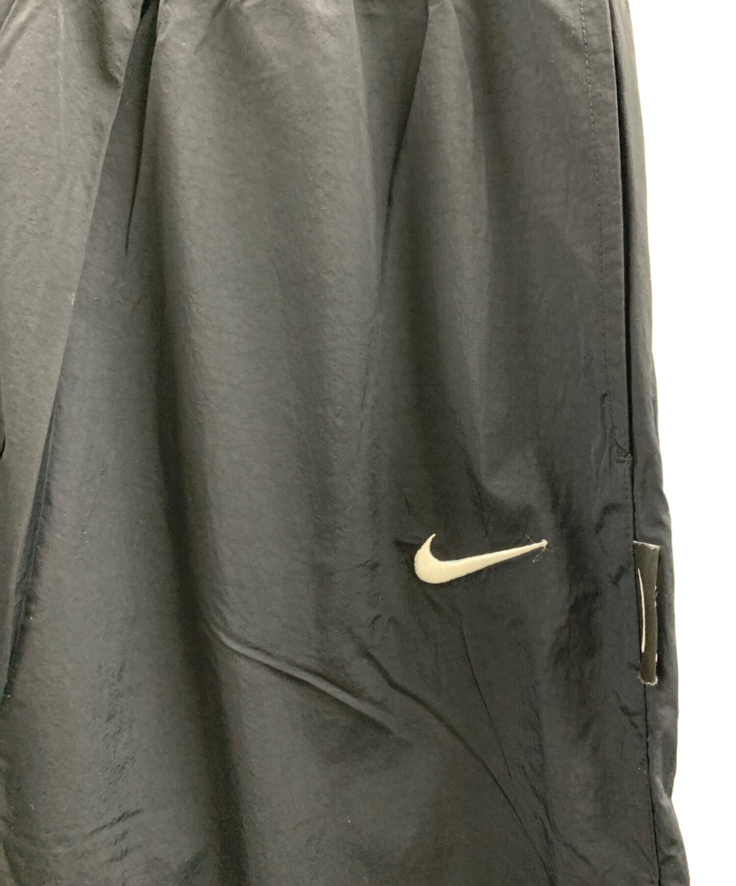 NIKE 00s ナイロンパンツ ワイド ブラック L 00s NIKE ナイロントラックパンツ リフレクターライン L 黒 | 古着屋 Uan