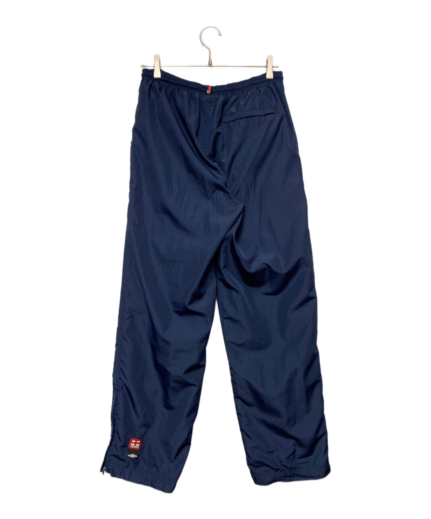 中古・古着通販】UMBRO (アンブロ) ナイロンパンツ ネイビー サイズ:M