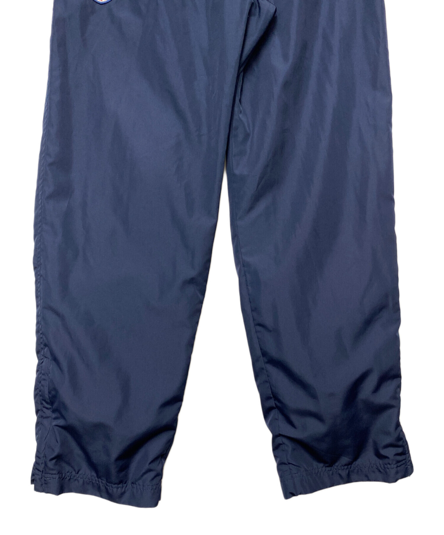 UMBRO ピステ 古着 中古・古着通販】UMBRO (アンブロ) ナイロンパンツ ネイビー サイズ:M