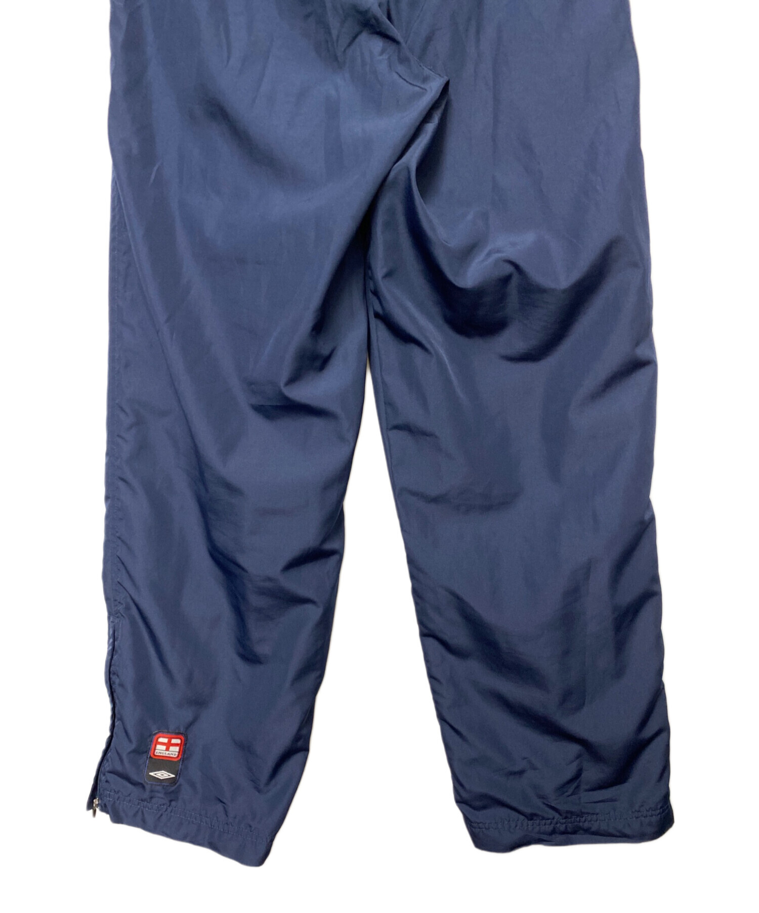 中古・古着通販】UMBRO (アンブロ) ナイロンパンツ ネイビー サイズ:M