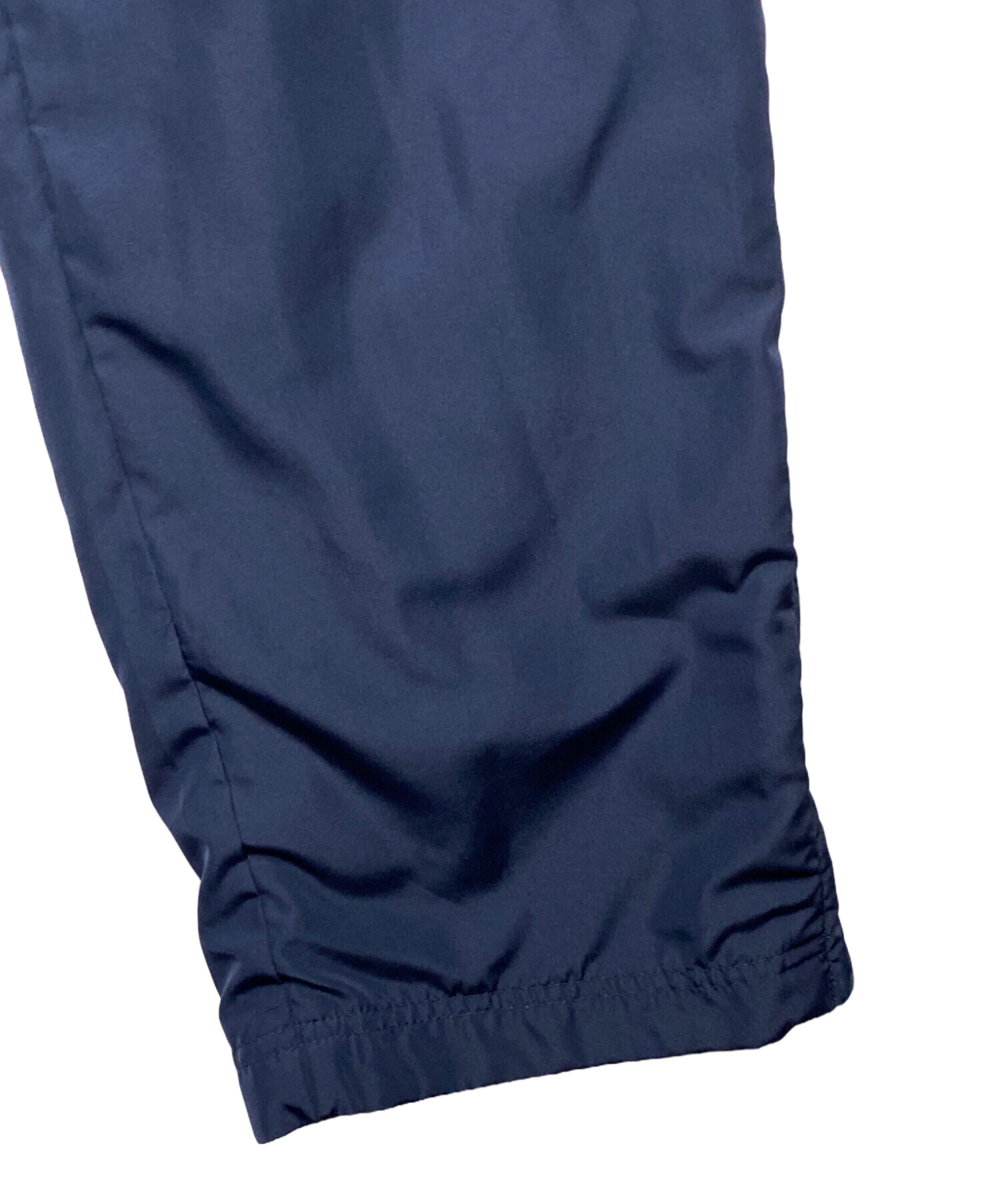 中古・古着通販】UMBRO (アンブロ) ナイロンパンツ ネイビー サイズ:M
