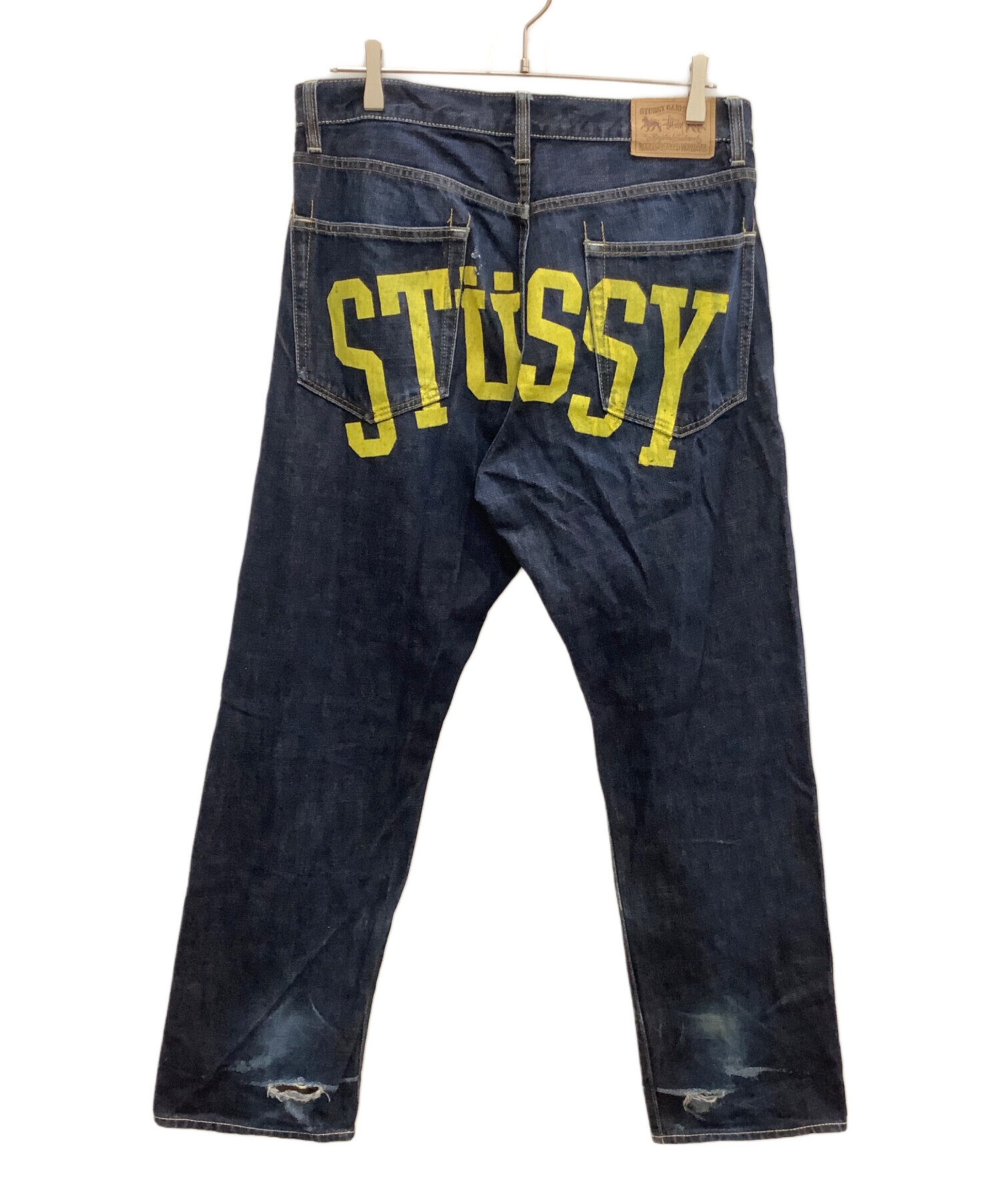 STUSSY ペイント ロゴ デニム ジーンズ 34 中古・古着通販】stussy (ステューシー) ペイントロゴデニムパンツ