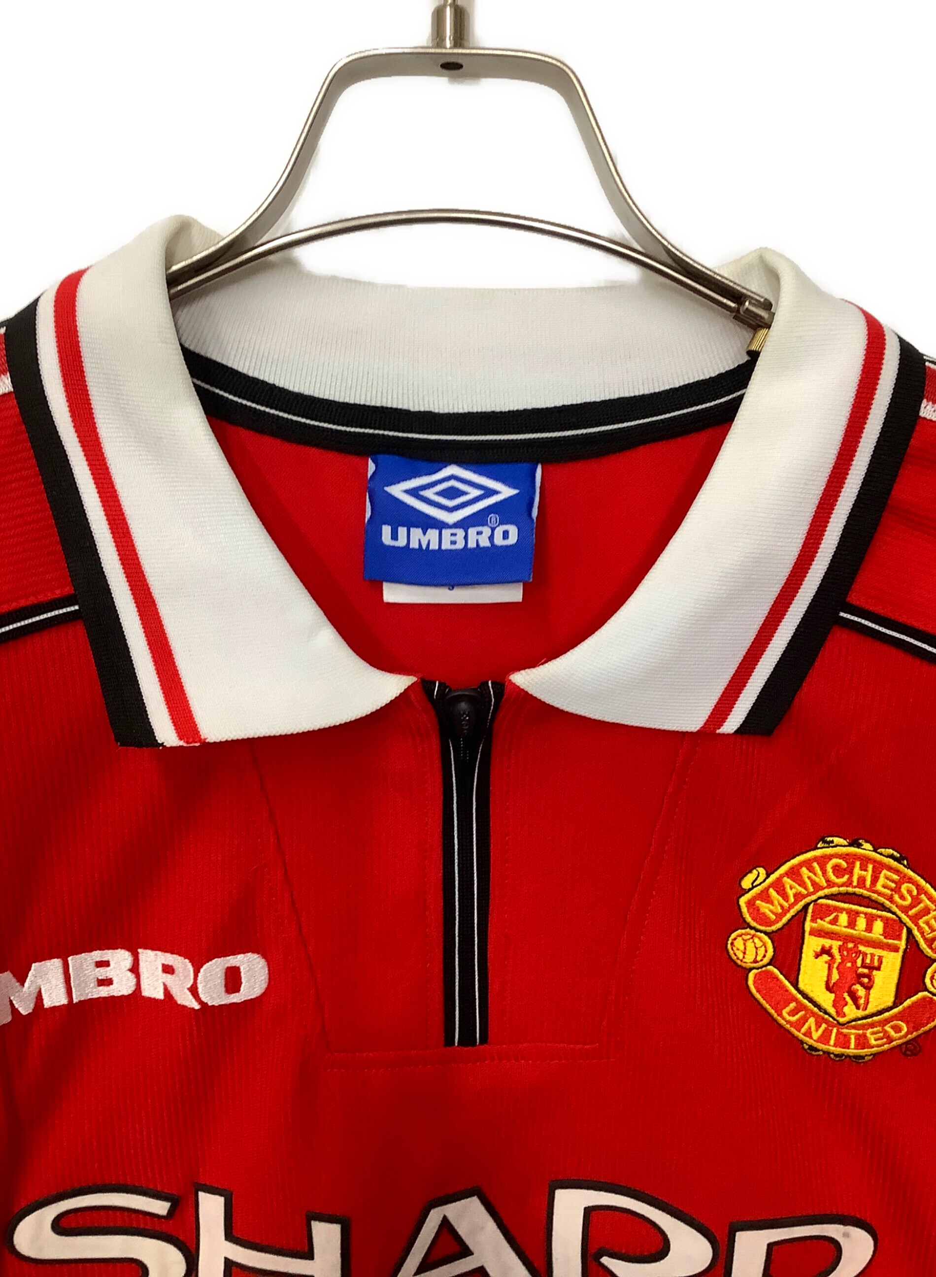 未使用 マンチェスター・ユナイテッド Umbro ポロシャツ 中古・古着通販】UMBRO (アンブロ) 長袖ユニフォームポロシャツ レッド