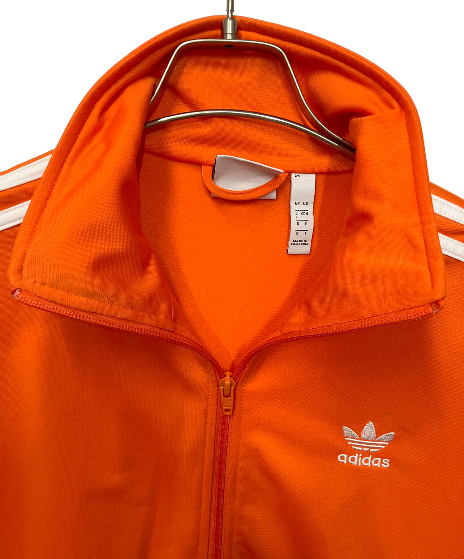 中古・古着通販】adidas (アディダス) トラックジャケット オレンジ