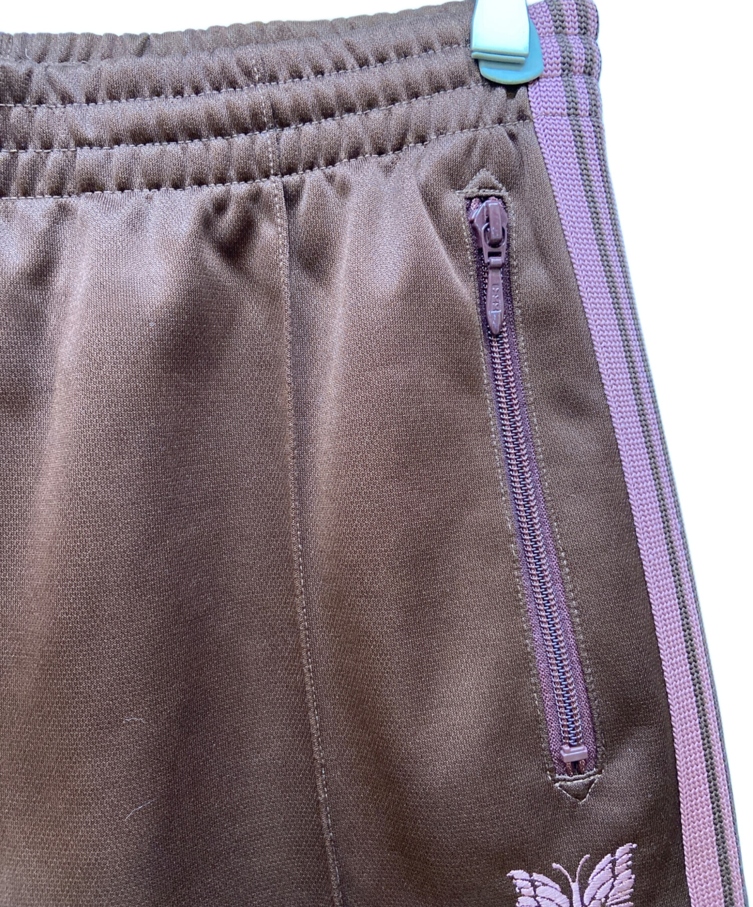 25AW Needles トラックパンツ ヒザデル ブラウン ピンク S 中古・古着通販】Needles (ニードルズ) トラックパンツ ブラウン