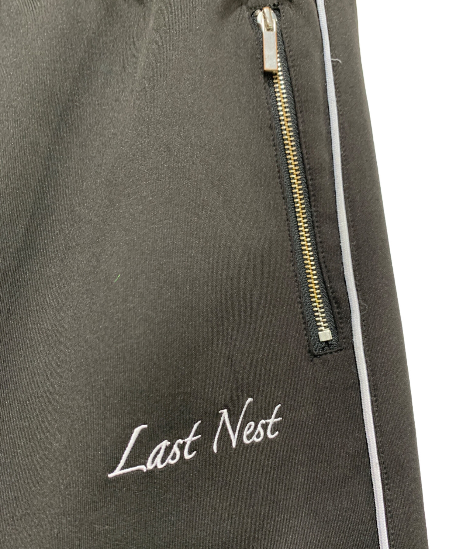 LAST NEST フレアパンツ　Lサイズ 中古・古着通販】LAST NEST (ラストネスト) フレアトラックパンツ