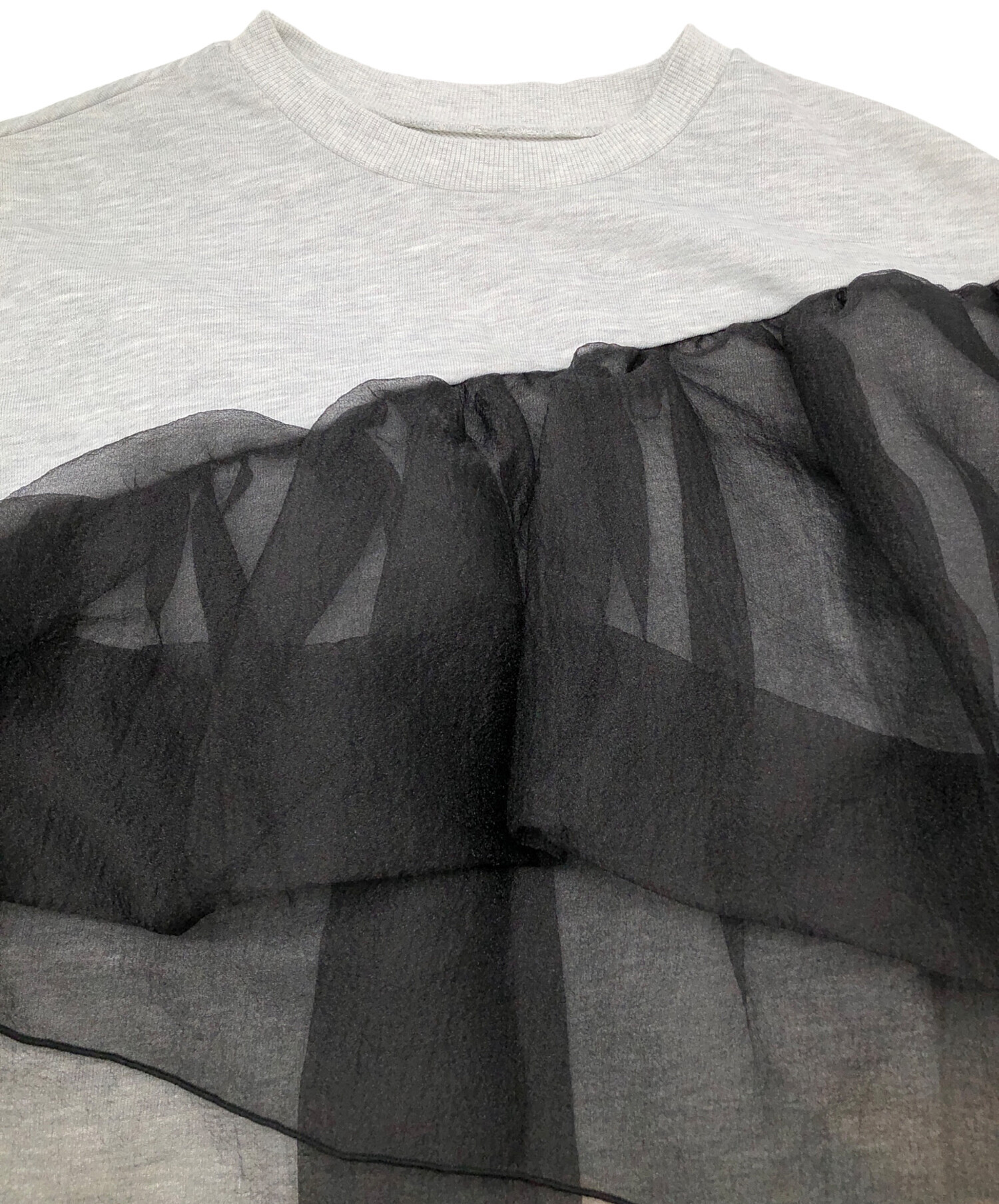 トップス willfully organdy docking sweat tops WILLFULLY（ウィルフリー）の「slant organdy docking sweat