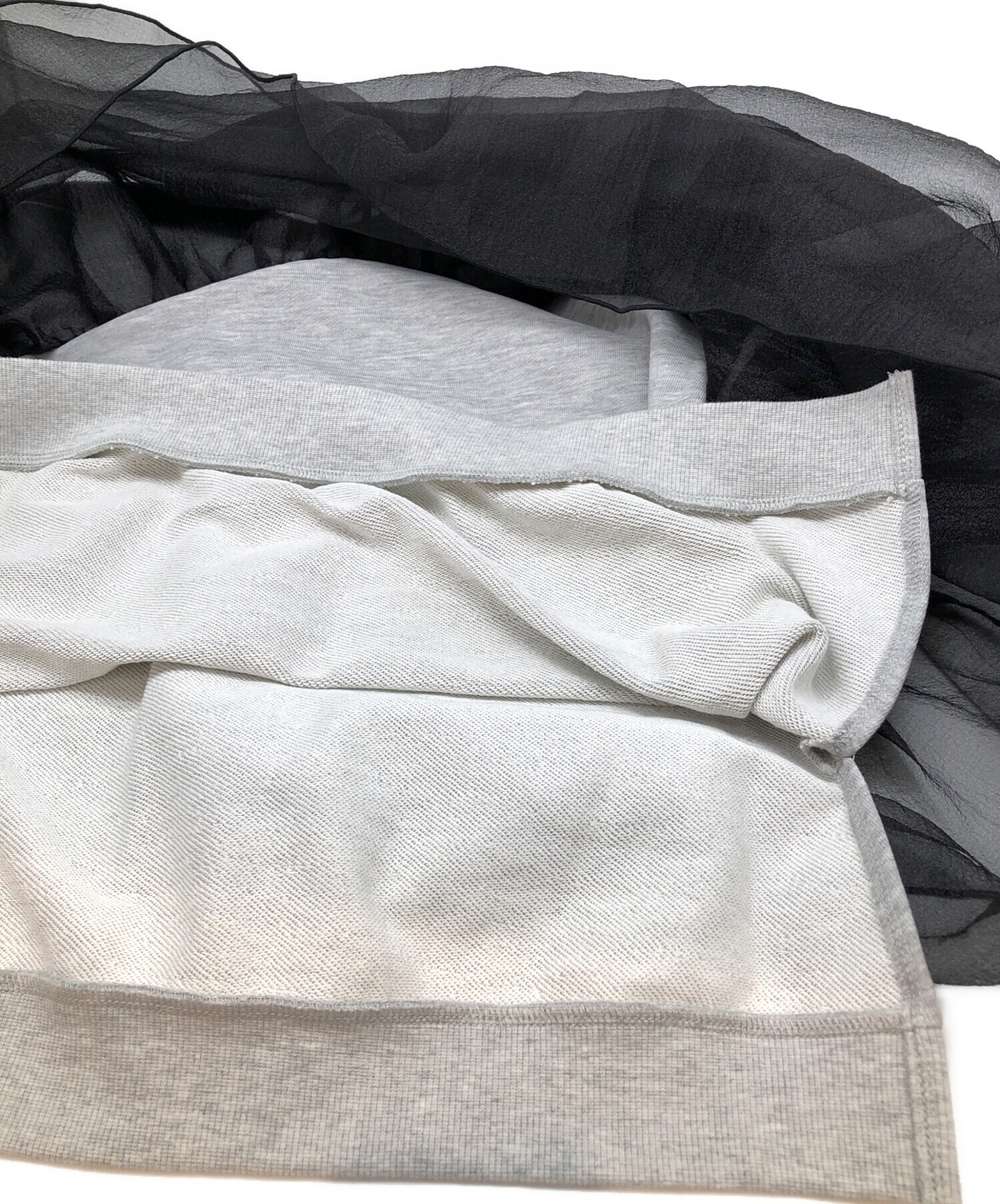 トップス willfully organdy docking sweat tops WILLFULLY（ウィルフリー）の「slant organdy docking sweat