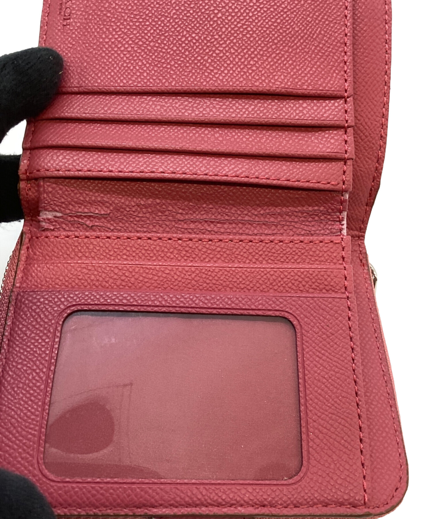 COACH 二つ折り財布　ピンク 中古・古着通販】COACH (コーチ) 2つ折り財布 ピンク｜ブランド・古着
