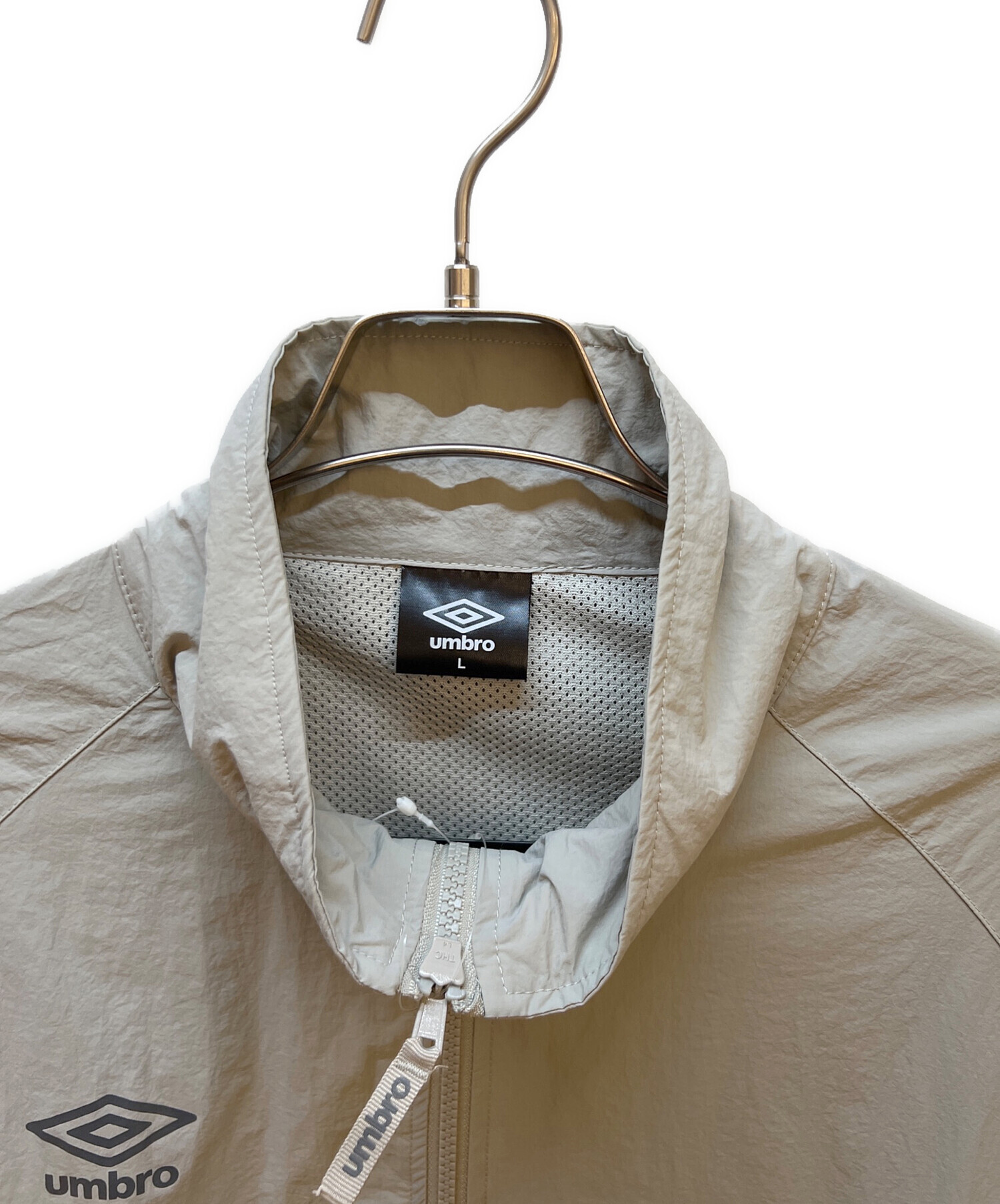 中古・古着通販】UMBRO (アンブロ) ナイロンジャケット ベージュ
