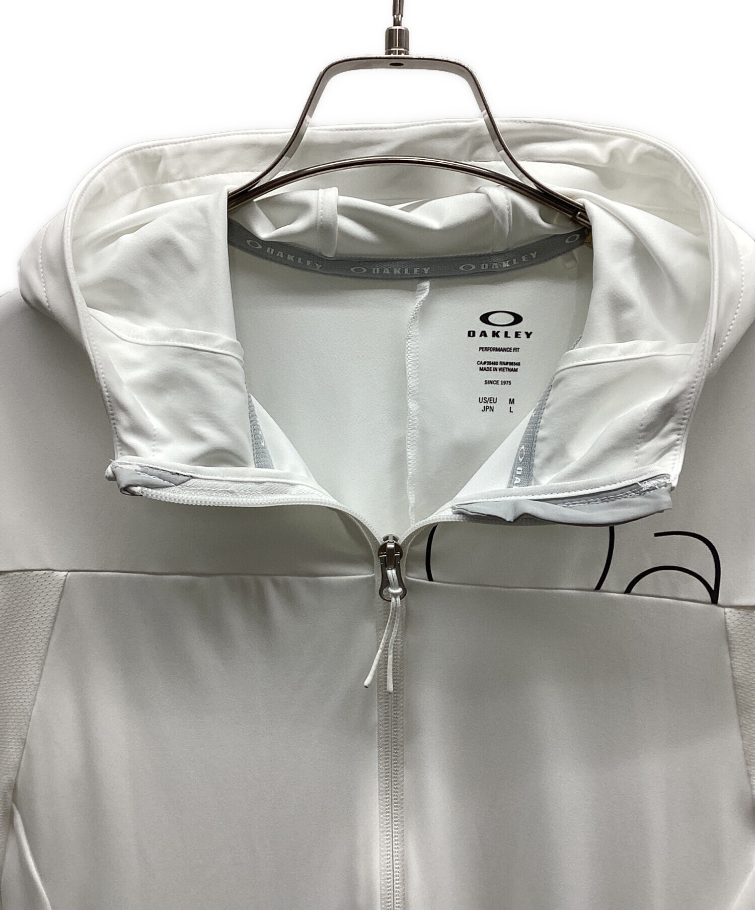 中古・古着通販】OAKLEY (オークリー) ジップパーカー ホワイト サイズ