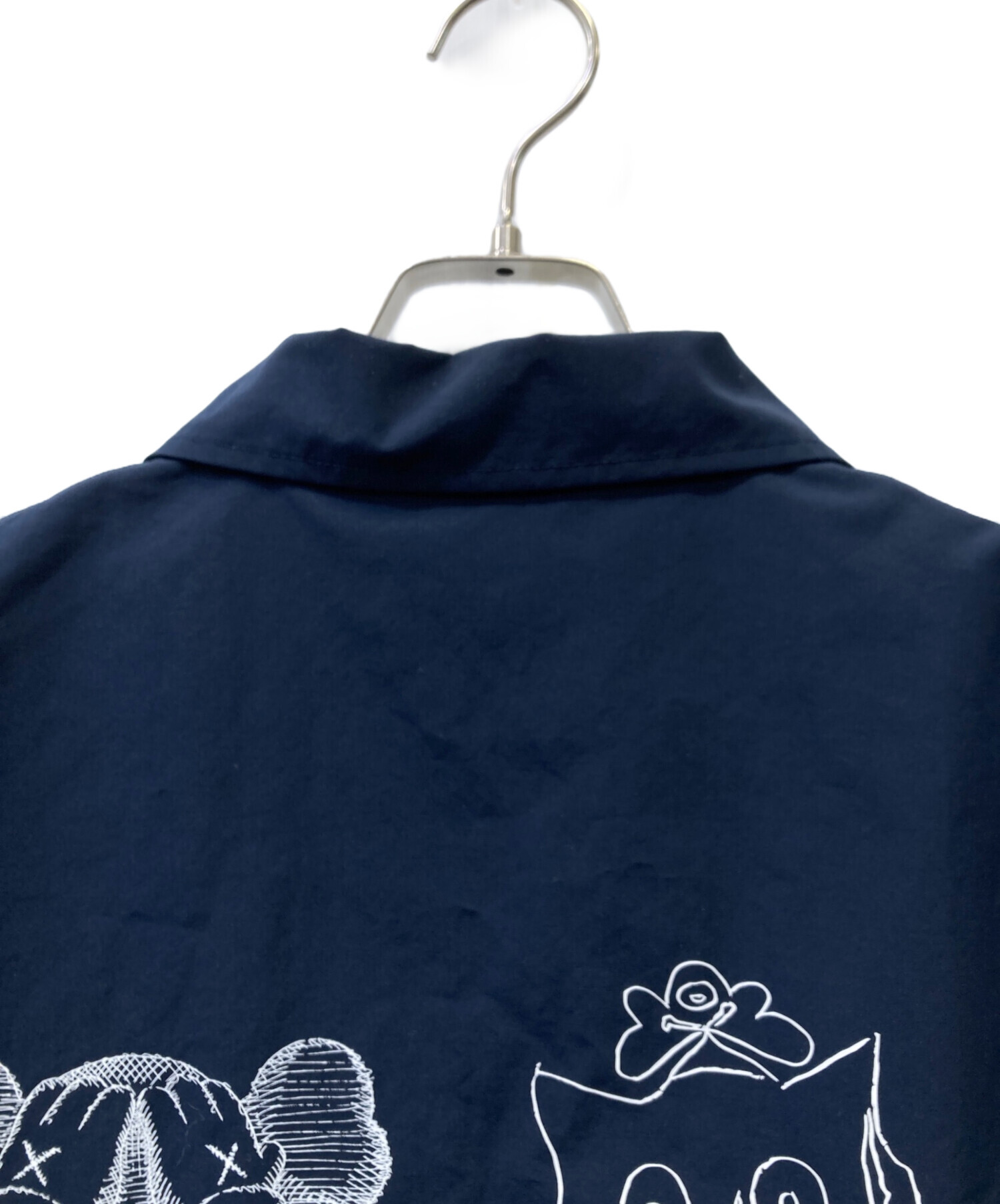 ユニクロカウズ新品未使用です カウズ × ユニクロ 長袖スウェットシャツ (USサイズ) ブラック - FW23 - JP