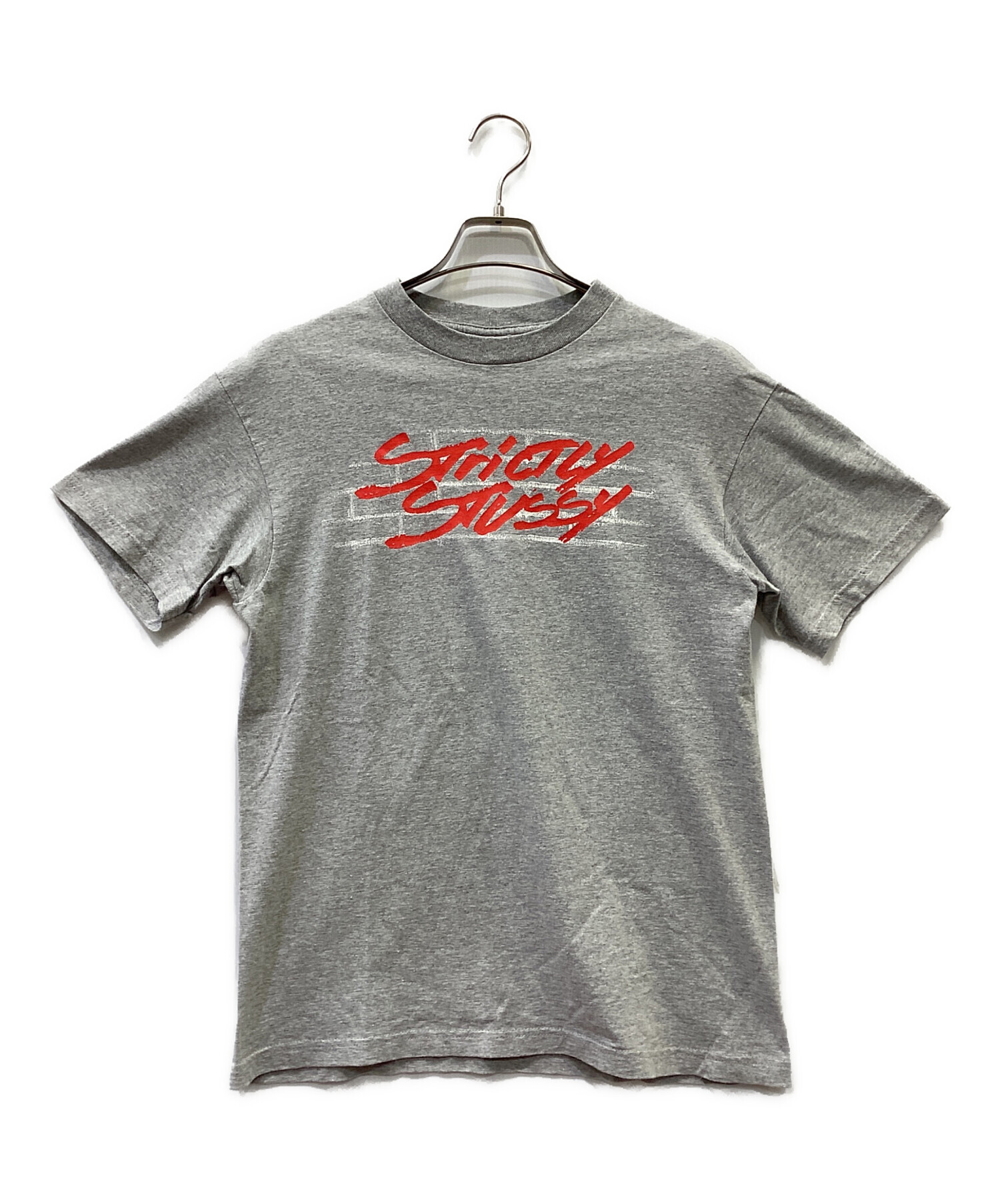 STUSSY ステューシー カジュアルシャツ S グレー 【古着】【中古】【送料無料】 中古・古着通販】stussy (ステューシー) Tシャツ グレー サイズ:M