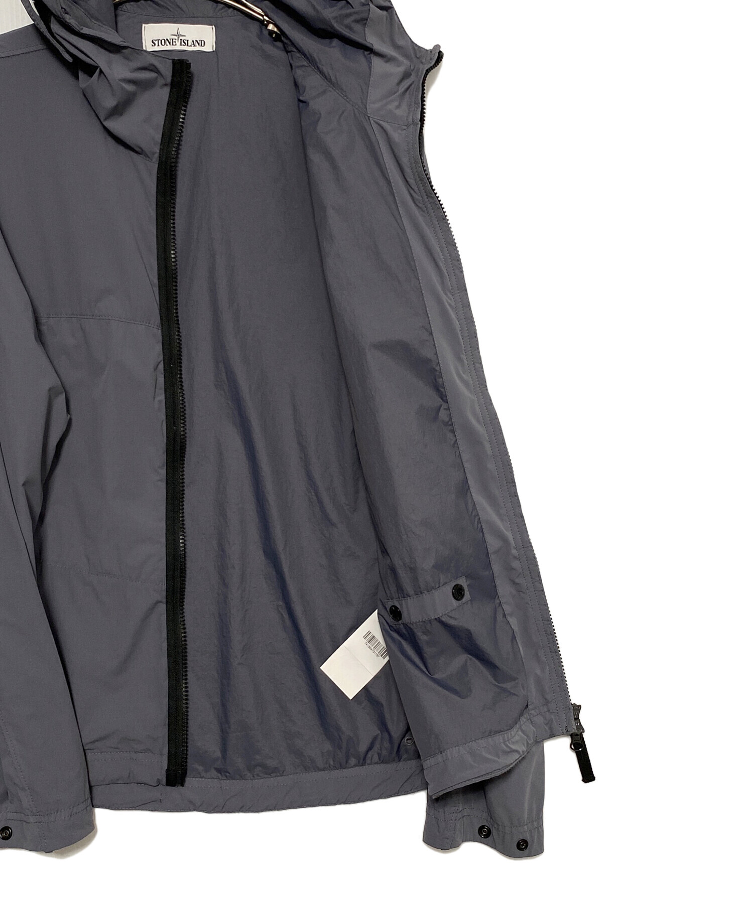 STONE  フード付きグレージャケット Stone Island フーデッド キルティングジャケット | グレー | FARFETCH JP