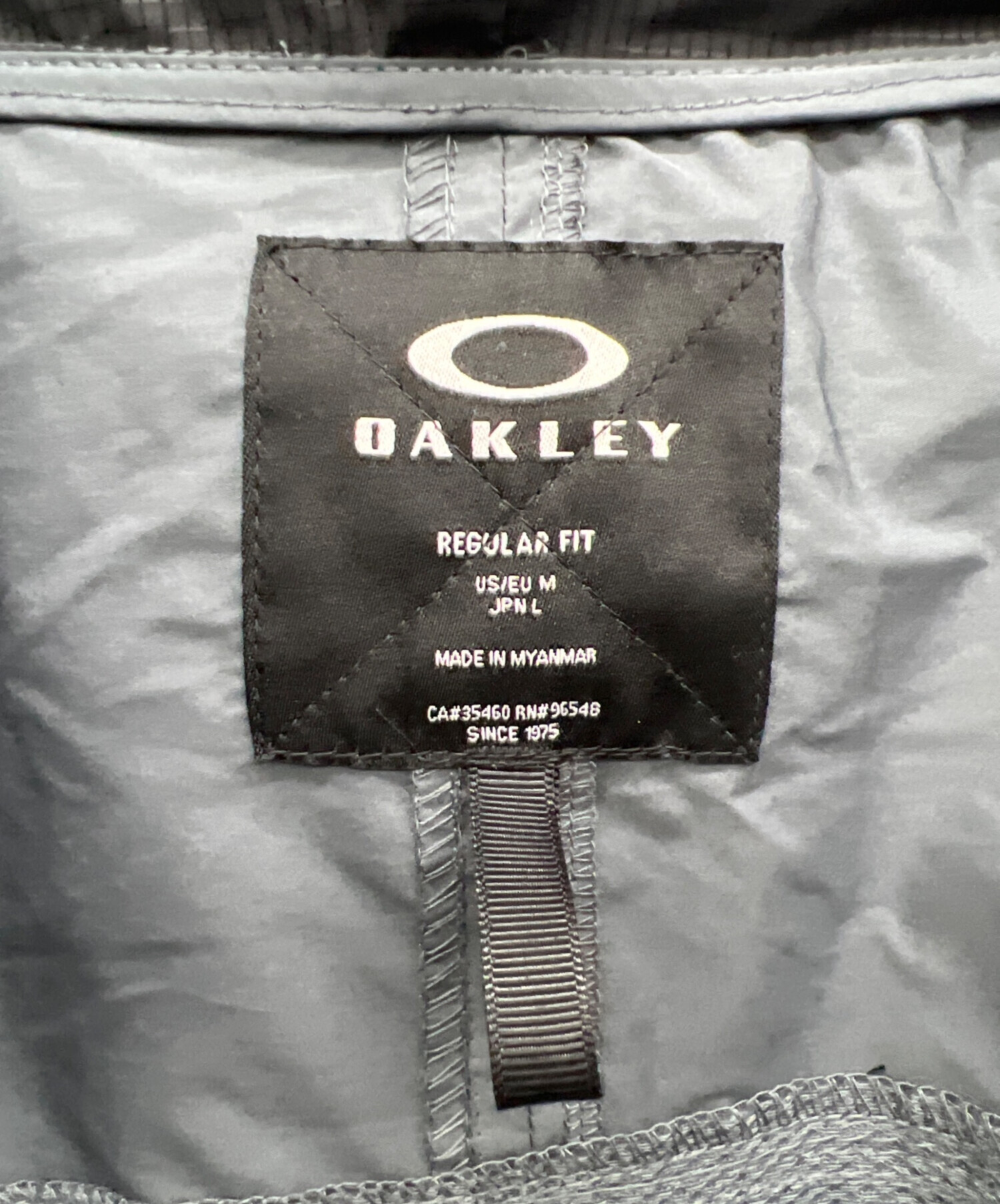 中古・古着通販】OAKLEY (オークリー) ウインドブレーカー グレー