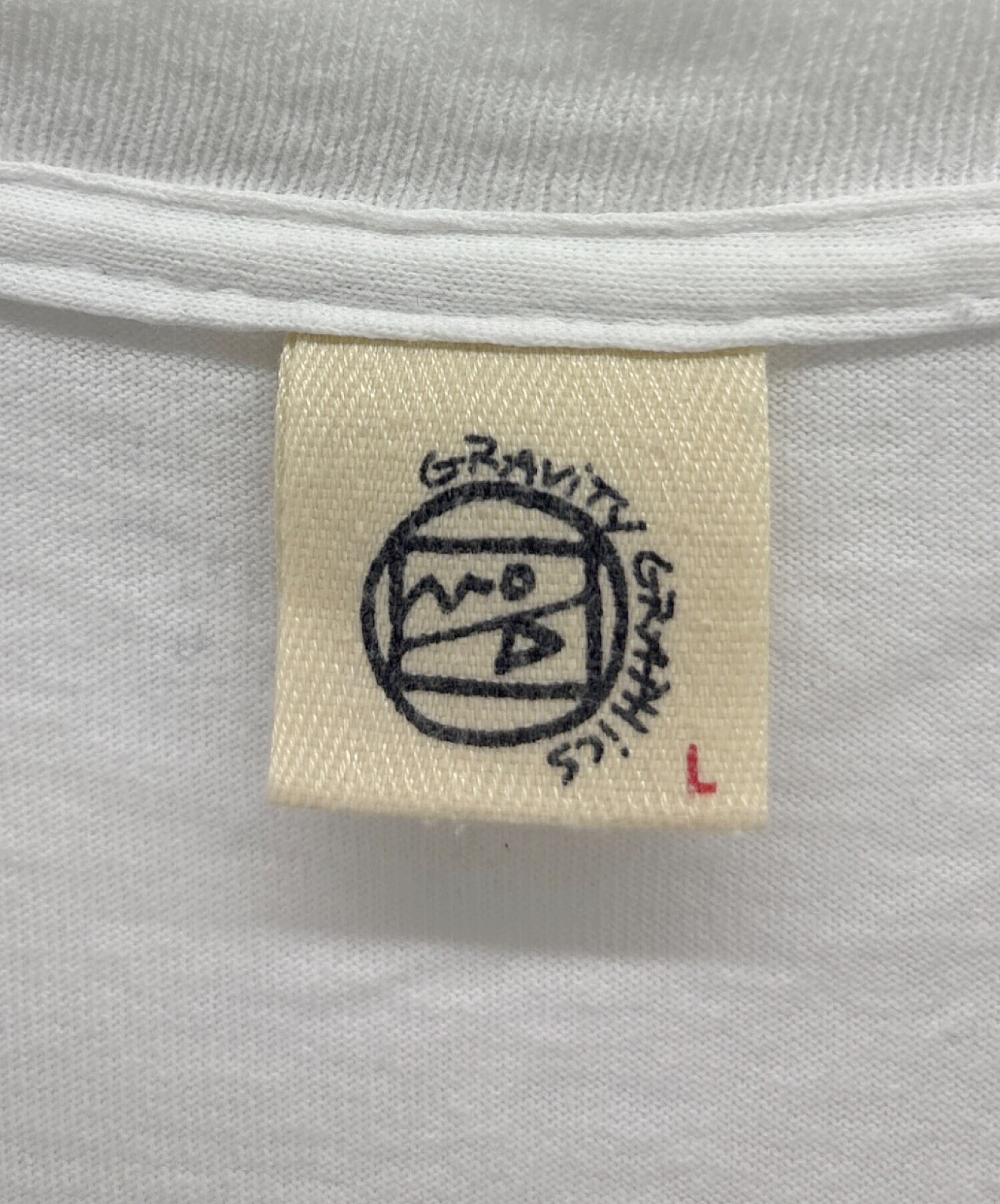 【未使用品！】Curansology グラフィックTシャツ ホワイト 中古・古着通販】GRAVITY GRAPHICS (グラビティグラフィックス