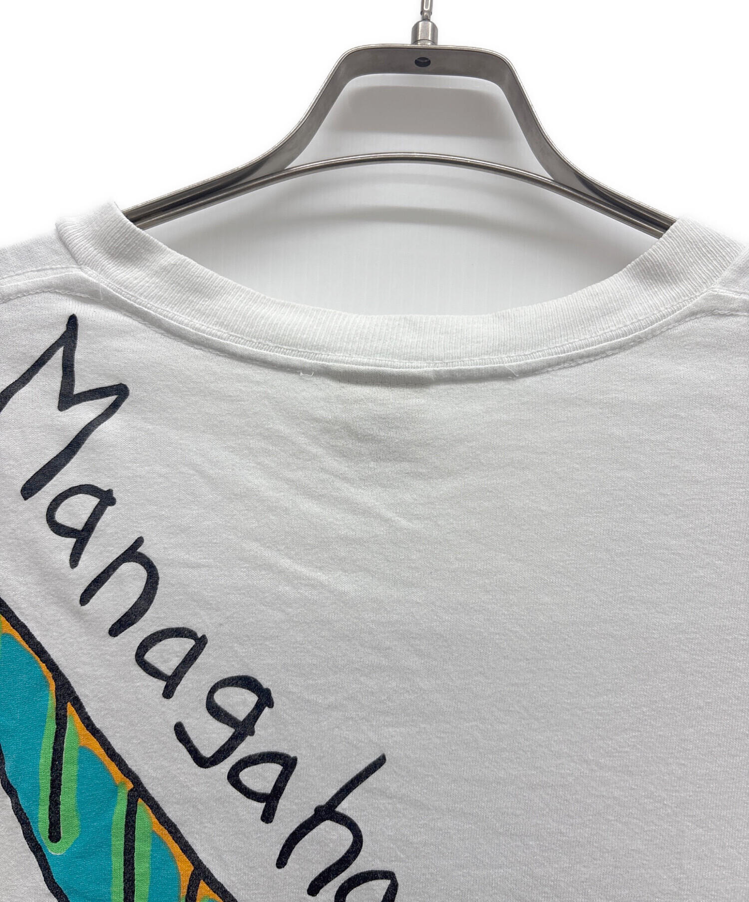 【未使用品！】Curansology グラフィックTシャツ ホワイト 中古・古着通販】GRAVITY GRAPHICS (グラビティグラフィックス