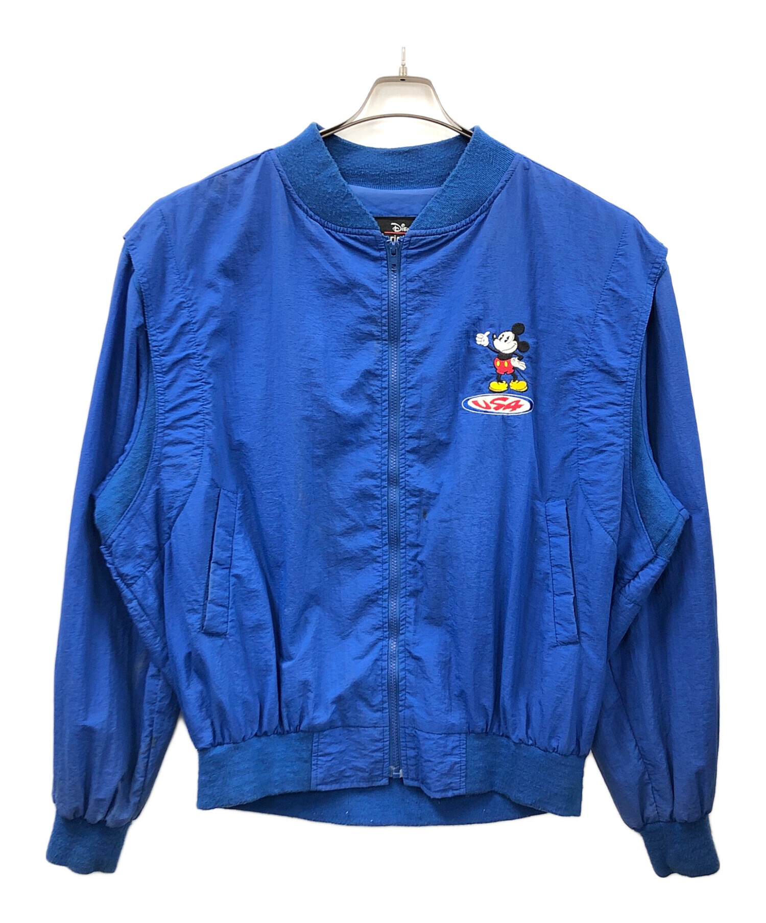 中古・古着通販】DISNEY (ディズニー) ナイロンジャケット ブルー 中古・古着通販】DISNEY (ディズニー) ナイロンジャケット ブルー