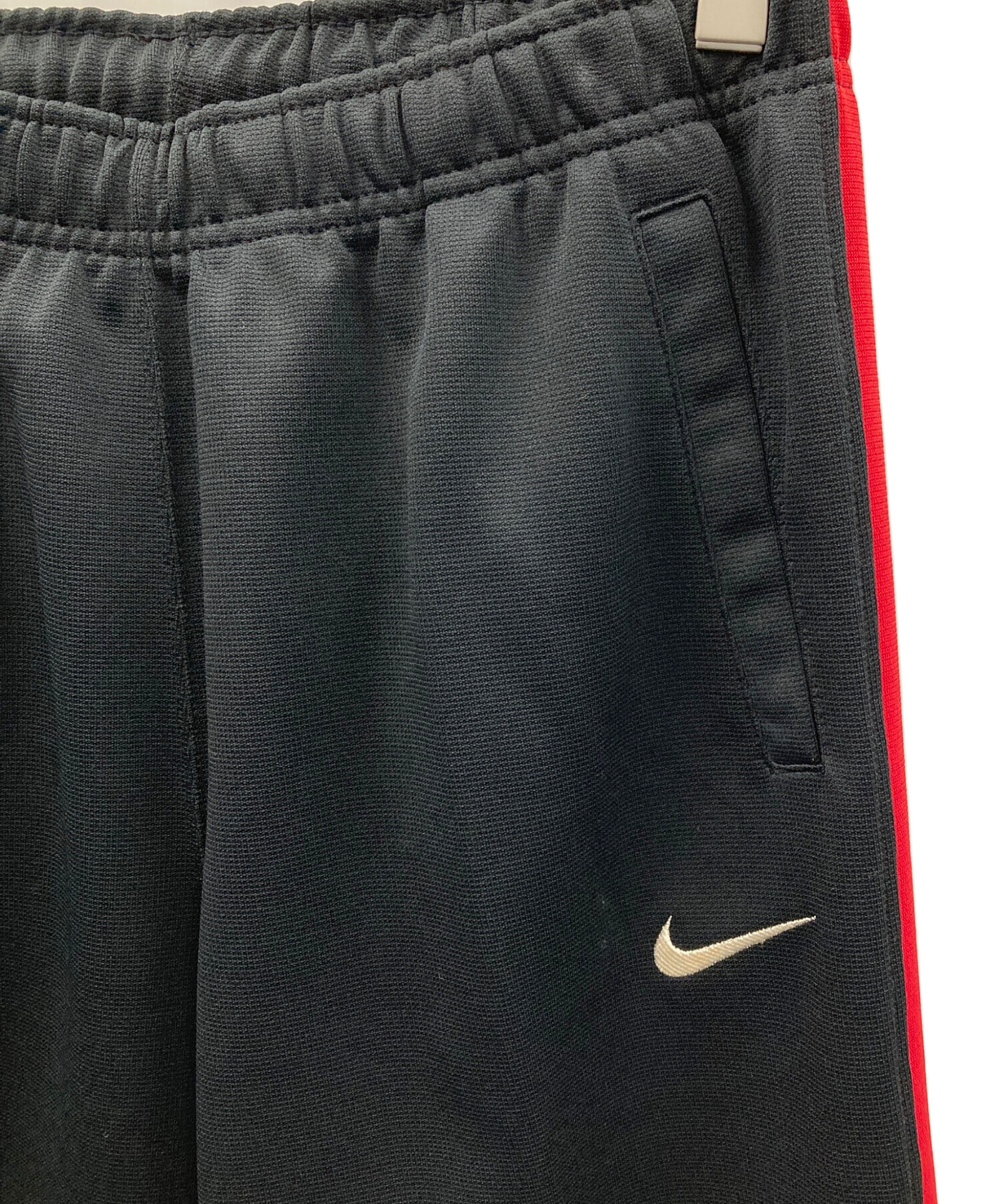 中古・古着通販】NIKE (ナイキ) トラックパンツ ブラック×レッド