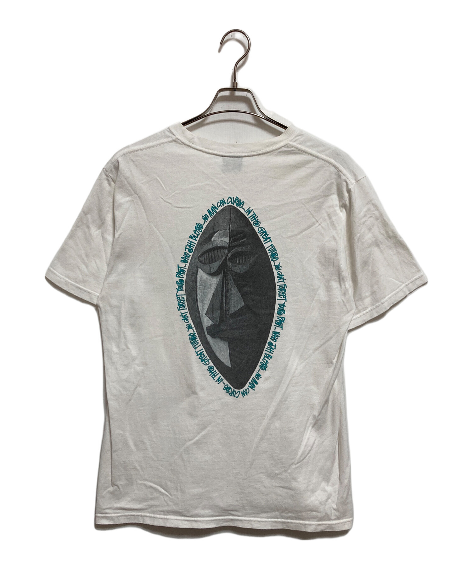 T*。様 00s STUSSYステューシー　Tribal Maskグッドプリント 中古・古着通販】stussy (ステューシー) TRIBAL MASK TEE ホワイト