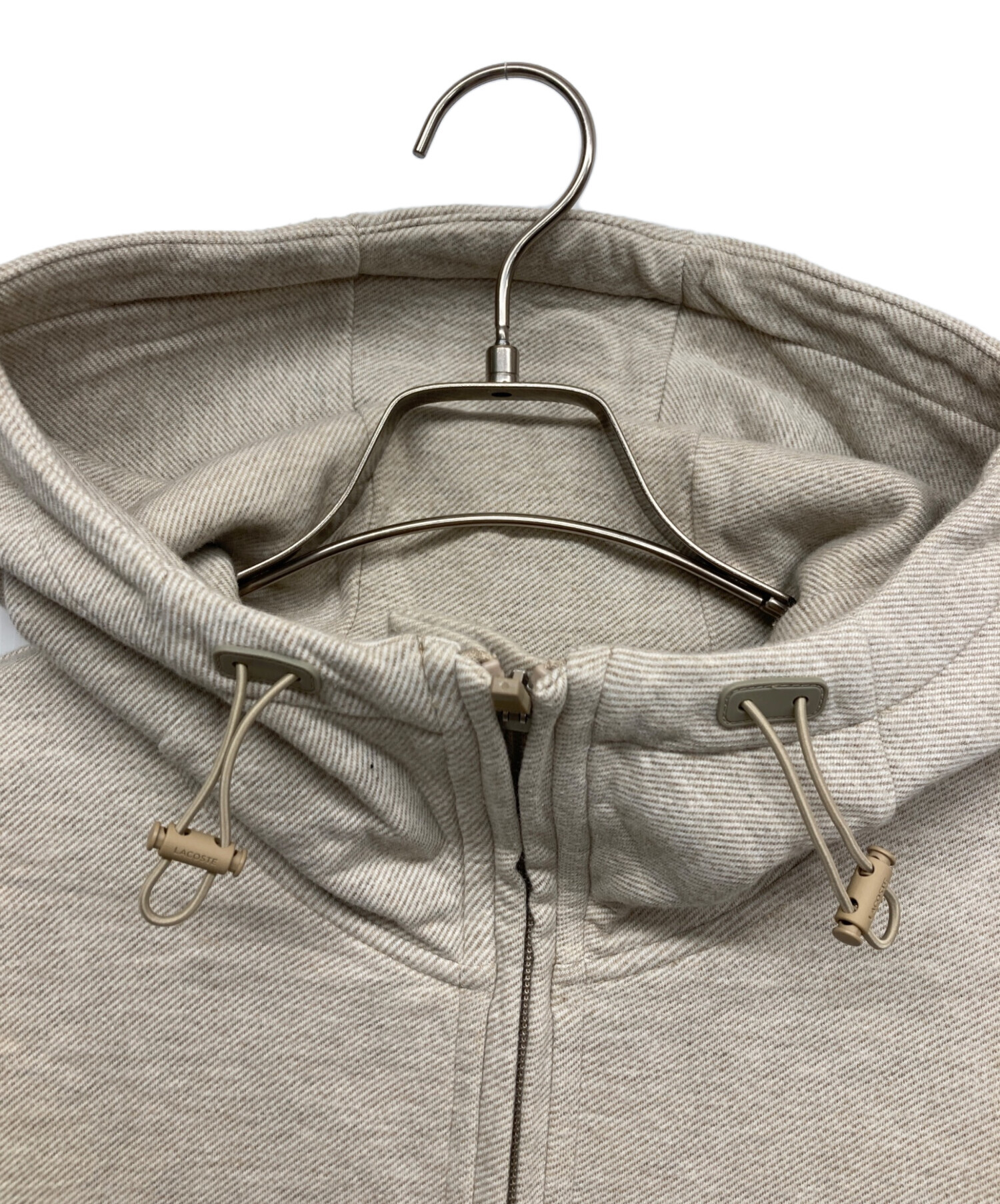 【新品未使用】Lacoste ラコステ ベージュ フード付きパーカー LACOSTE - 値下げ ラコステ ベージュ フード付きパーカー Mサイズの