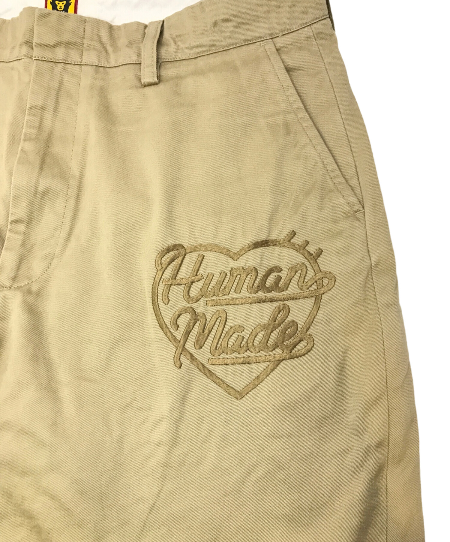 中古・古着通販】HUMAN MADE (ヒューマンメイド) チノパンツ ベージュ