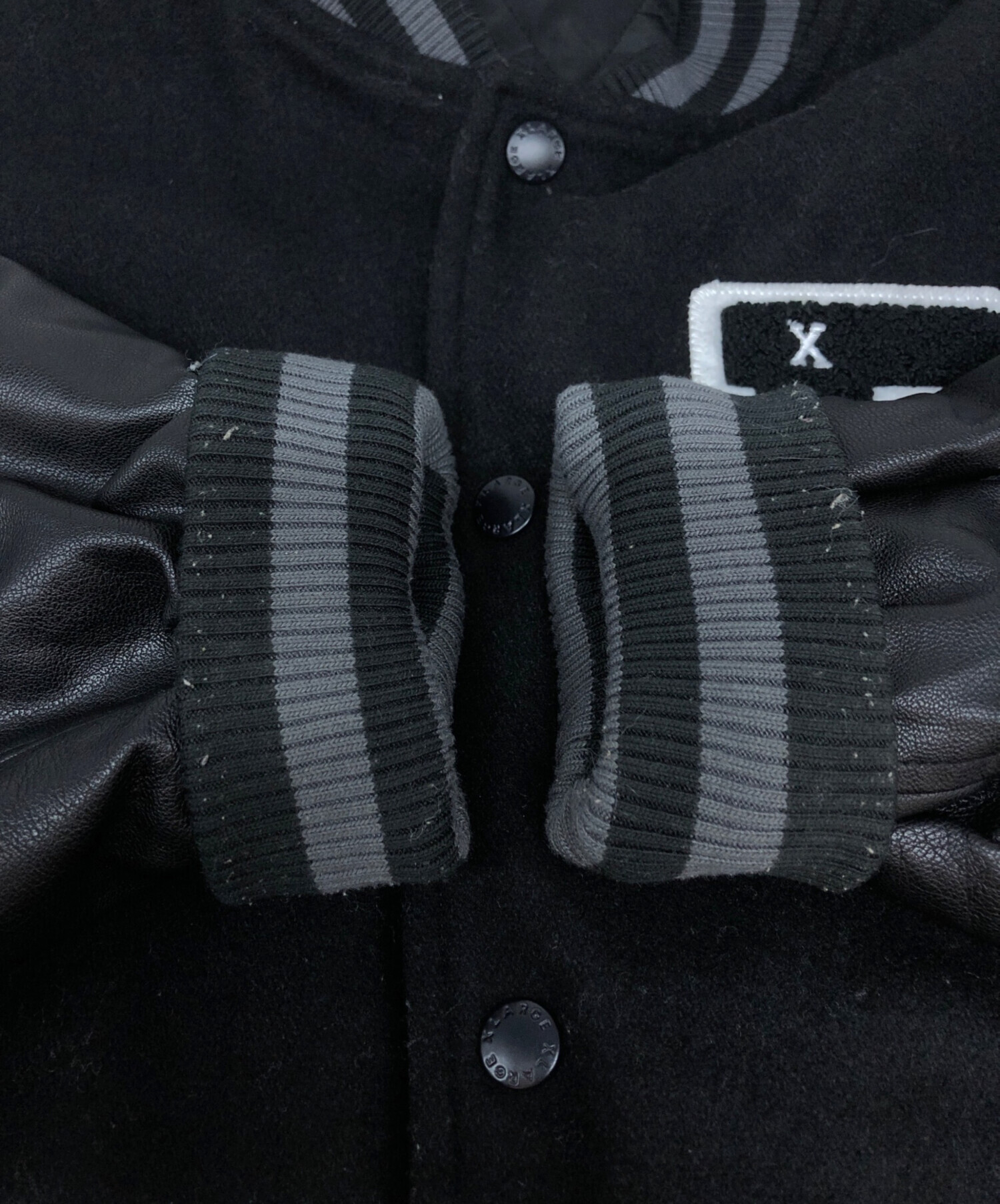 X-LARGE × balansa 限定コラボ スタジャン 黒 Mサイズ XLARGE（エクストララージ）の「XLARGE × BALANSA STADIUM JACKET