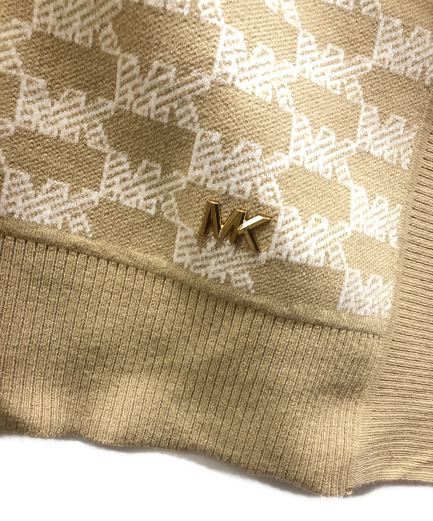 【未使用級】マイケルコース MKロゴ ジップアップ ニットポンチョ コットン混M 中古・古着通販】MICHAEL KORS (マイケルコース) ロゴグラムニット