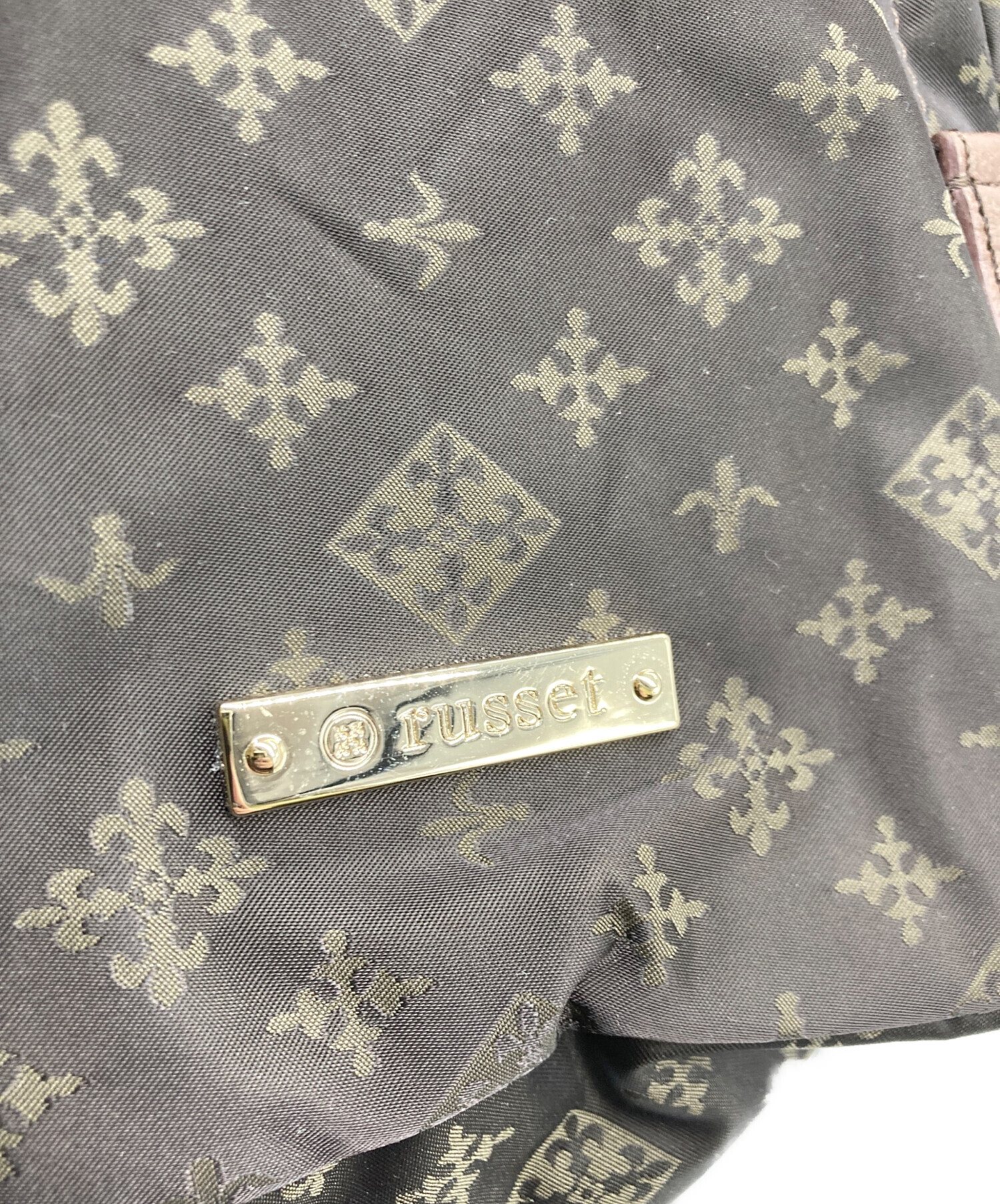 中古・古着通販】russet (ラシット) モノグラム柄リュック ブラウン