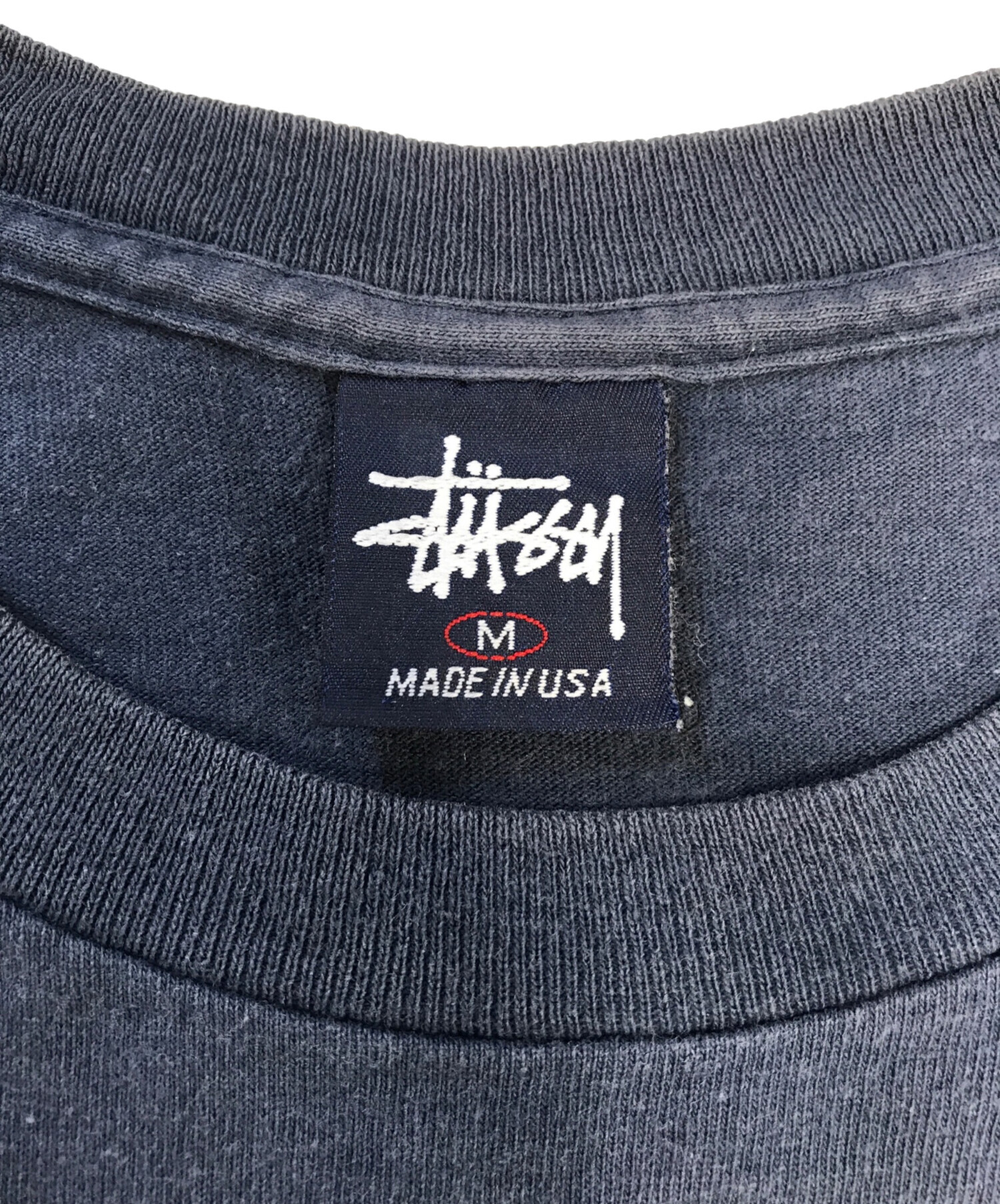 中古・古着通販】stussy (ステューシー) プリントTシャツ ネイビー